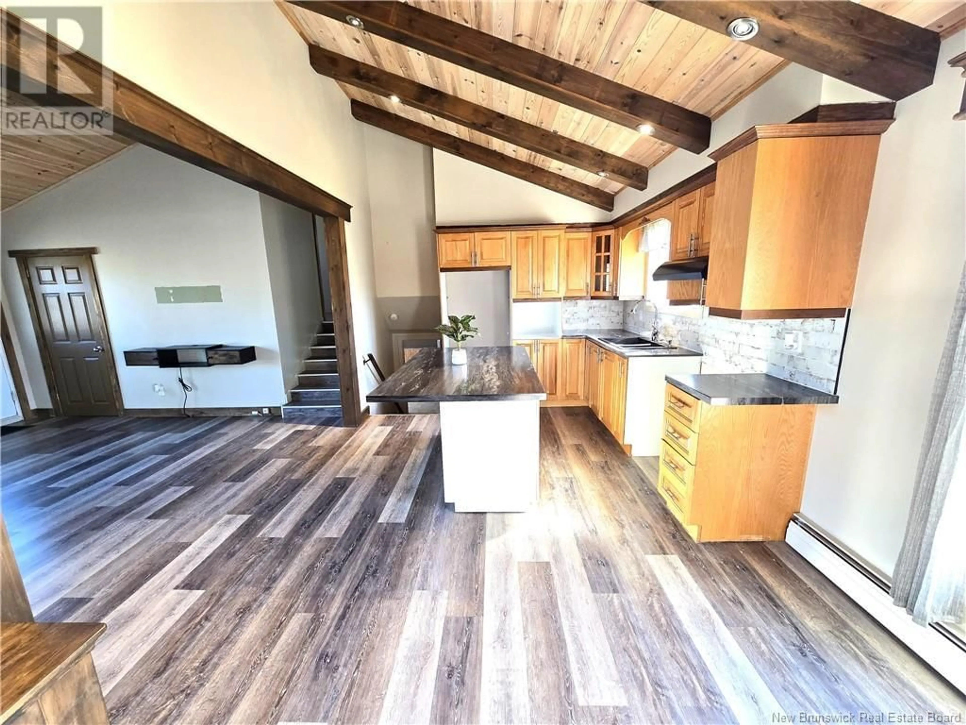 Open concept kitchen, wood/laminate floor for 69 LAURIER-LEVESQUE AVENUE, Saint-Jacques New Brunswick E7B1L3