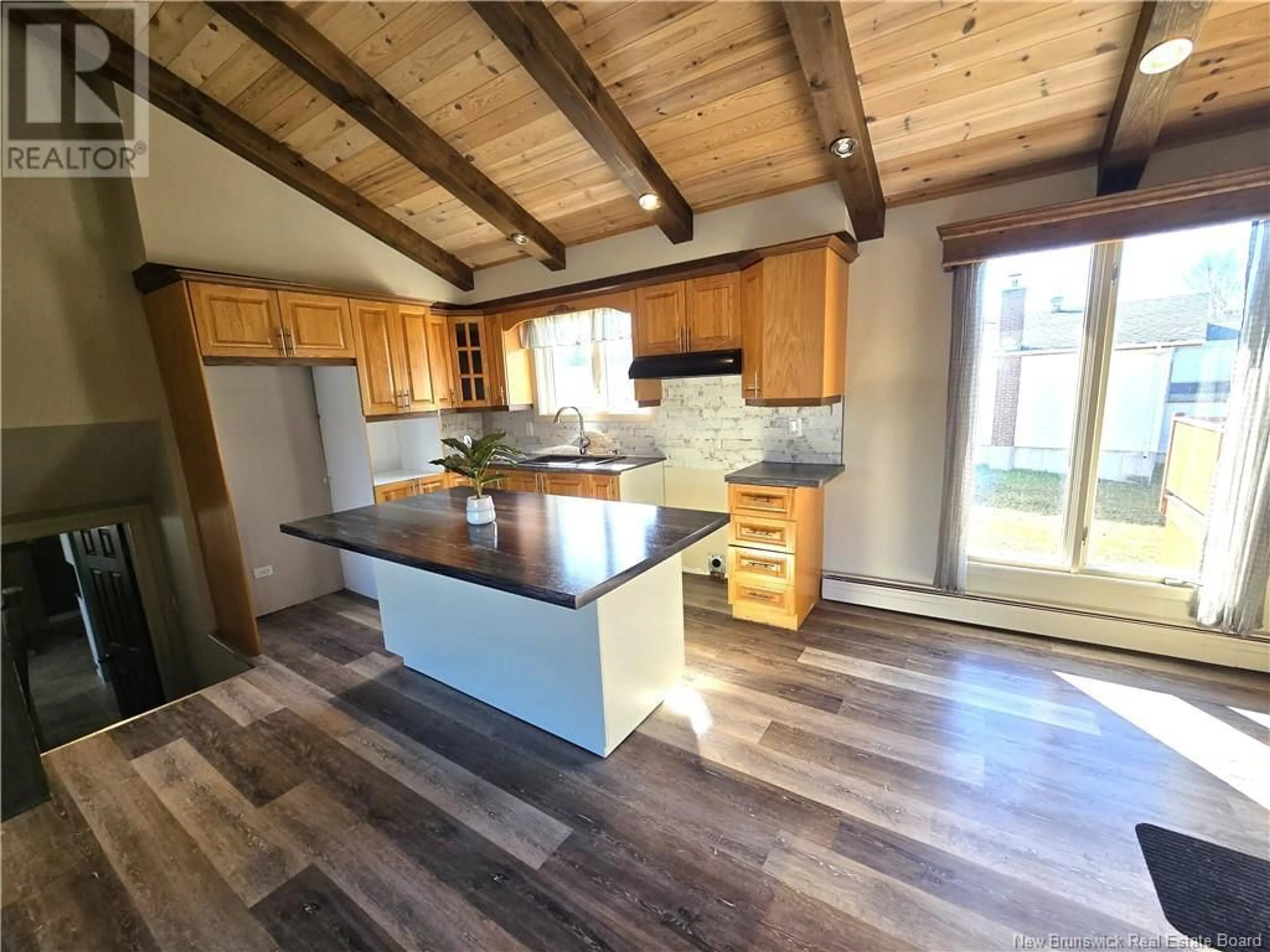 Open concept kitchen, wood/laminate floor for 69 LAURIER-LEVESQUE AVENUE, Saint-Jacques New Brunswick E7B1L3