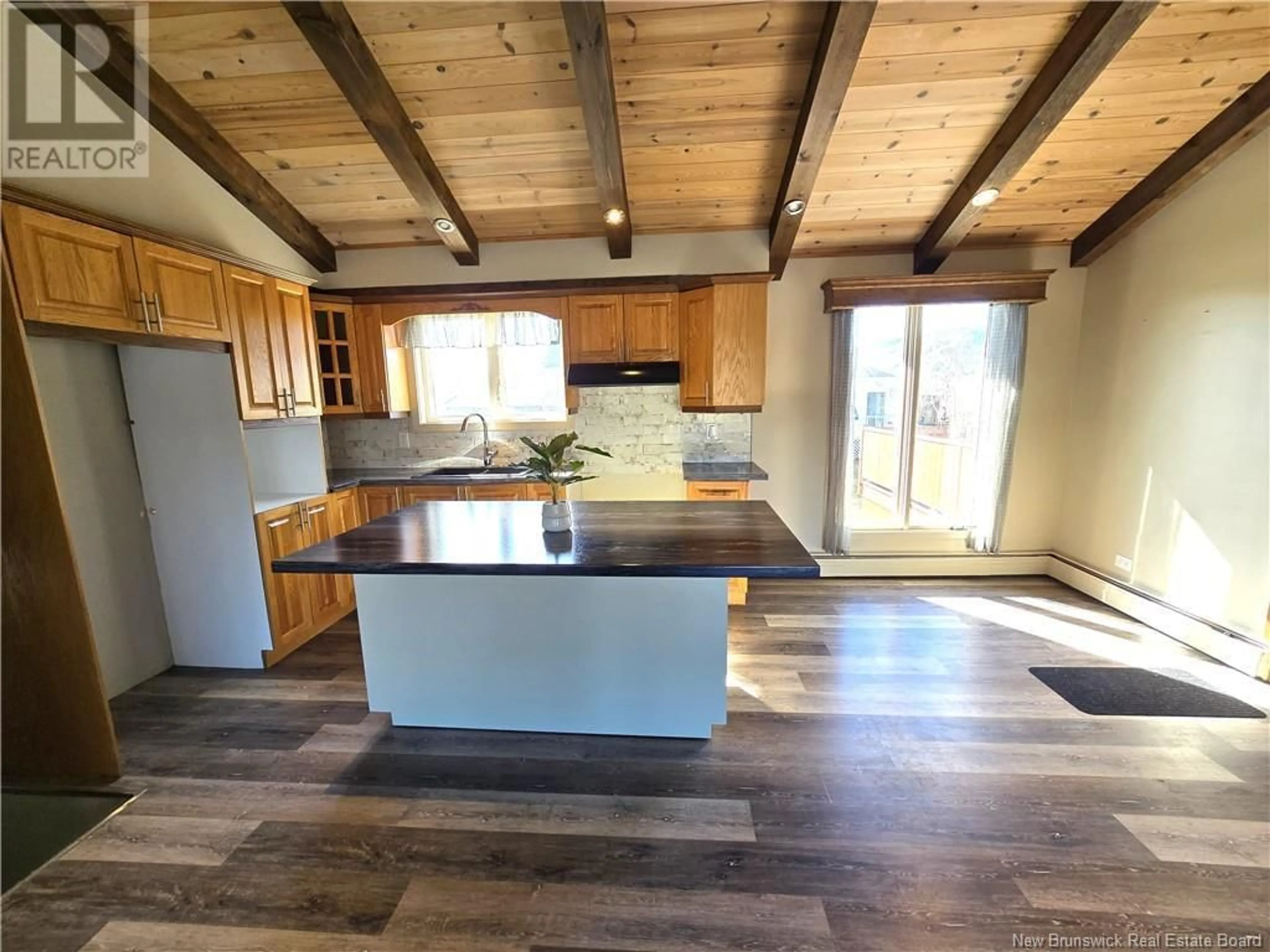 Open concept kitchen, wood/laminate floor for 69 LAURIER-LEVESQUE AVENUE, Saint-Jacques New Brunswick E7B1L3