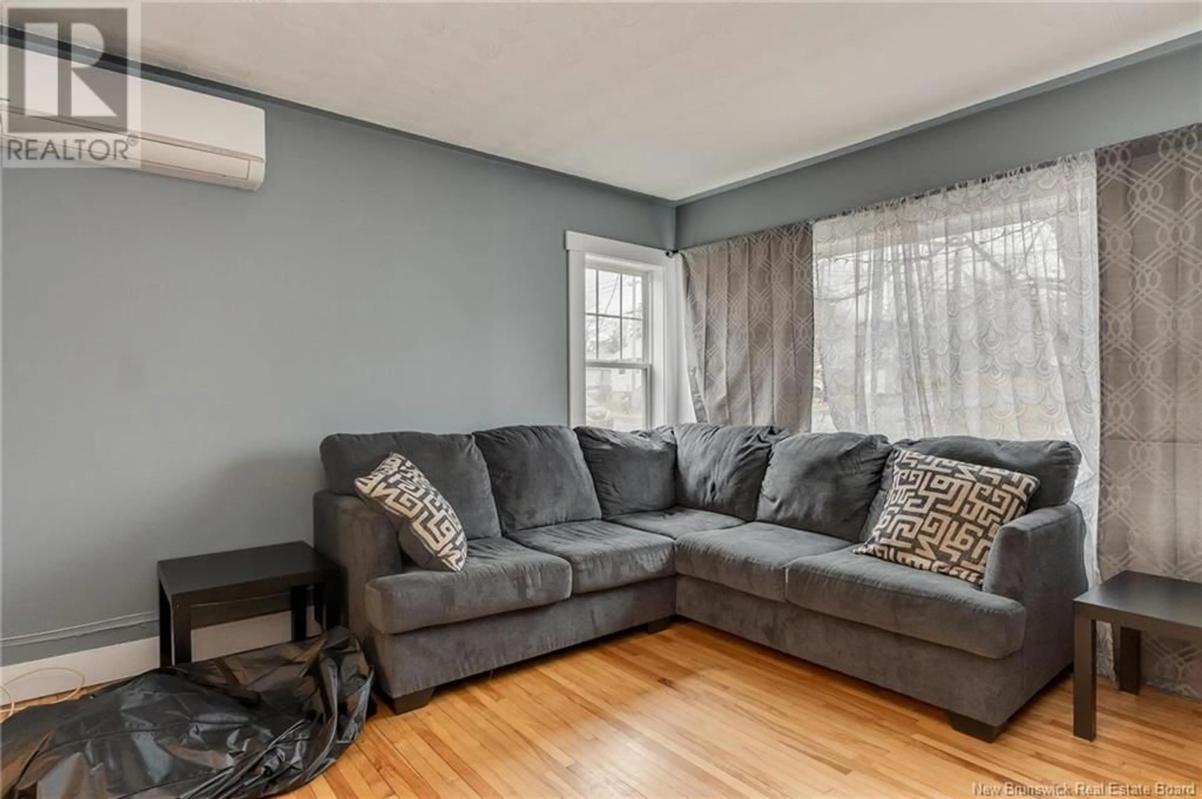 Living room with furniture, unknown for 28 FOLEY COURT, Saint John New Brunswick E2J1B9