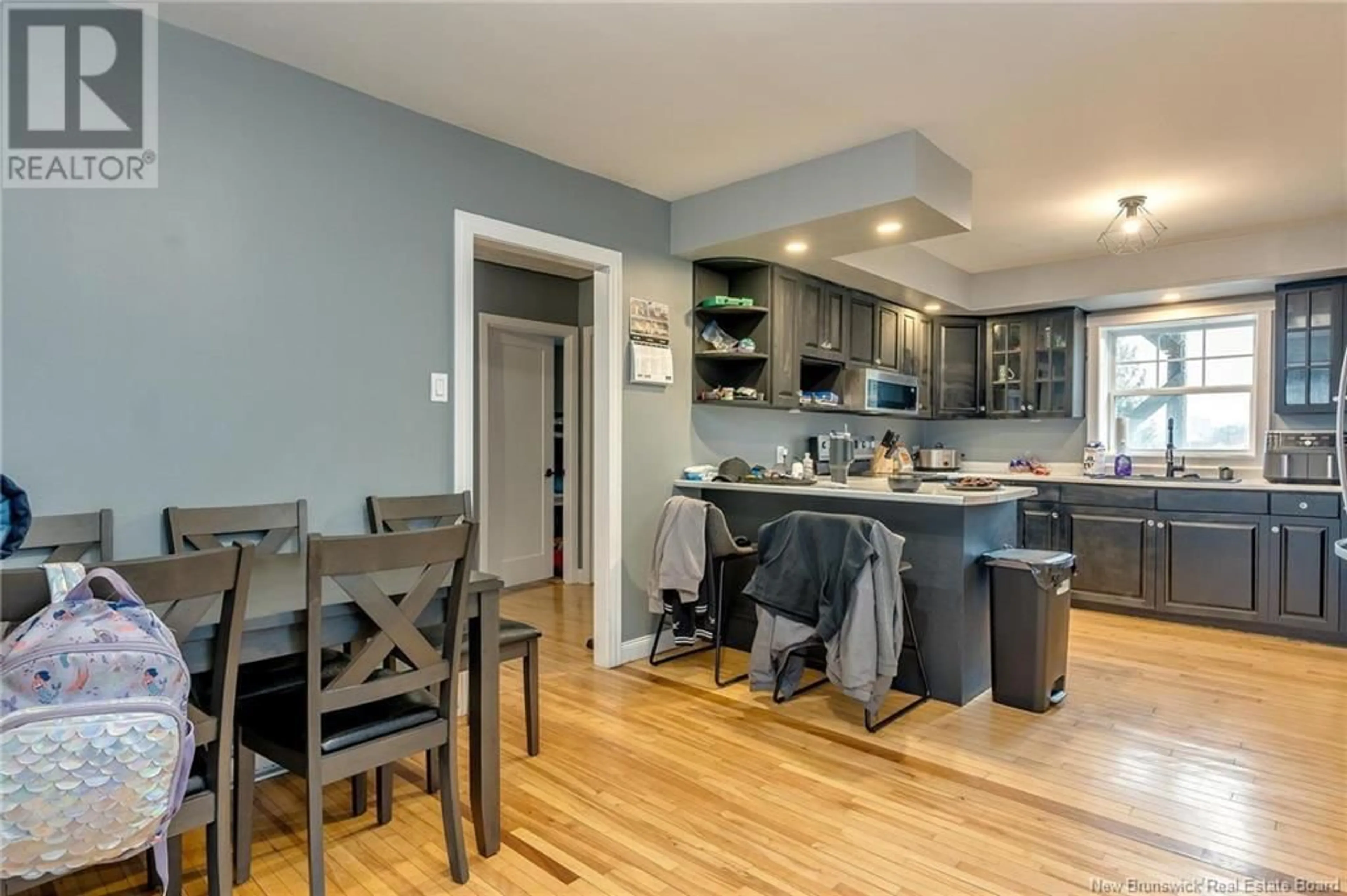 Open concept kitchen, wood/laminate floor for 28 FOLEY COURT, Saint John New Brunswick E2J1B9