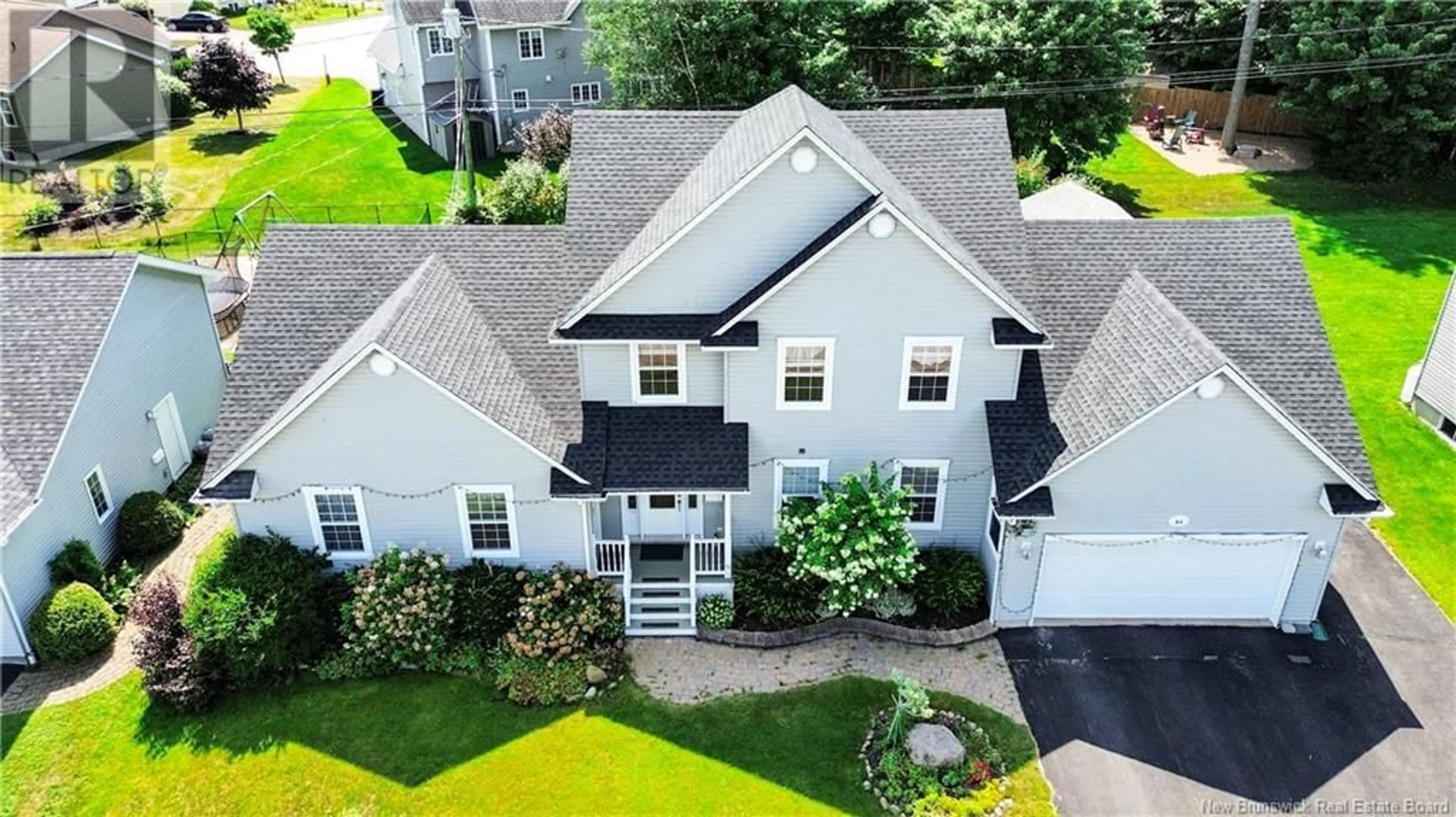 A pic from outside/outdoor area/front of a property/back of a property/a pic from drone, street for 64 MCANDREW STREET, Moncton New Brunswick E1G4Z3