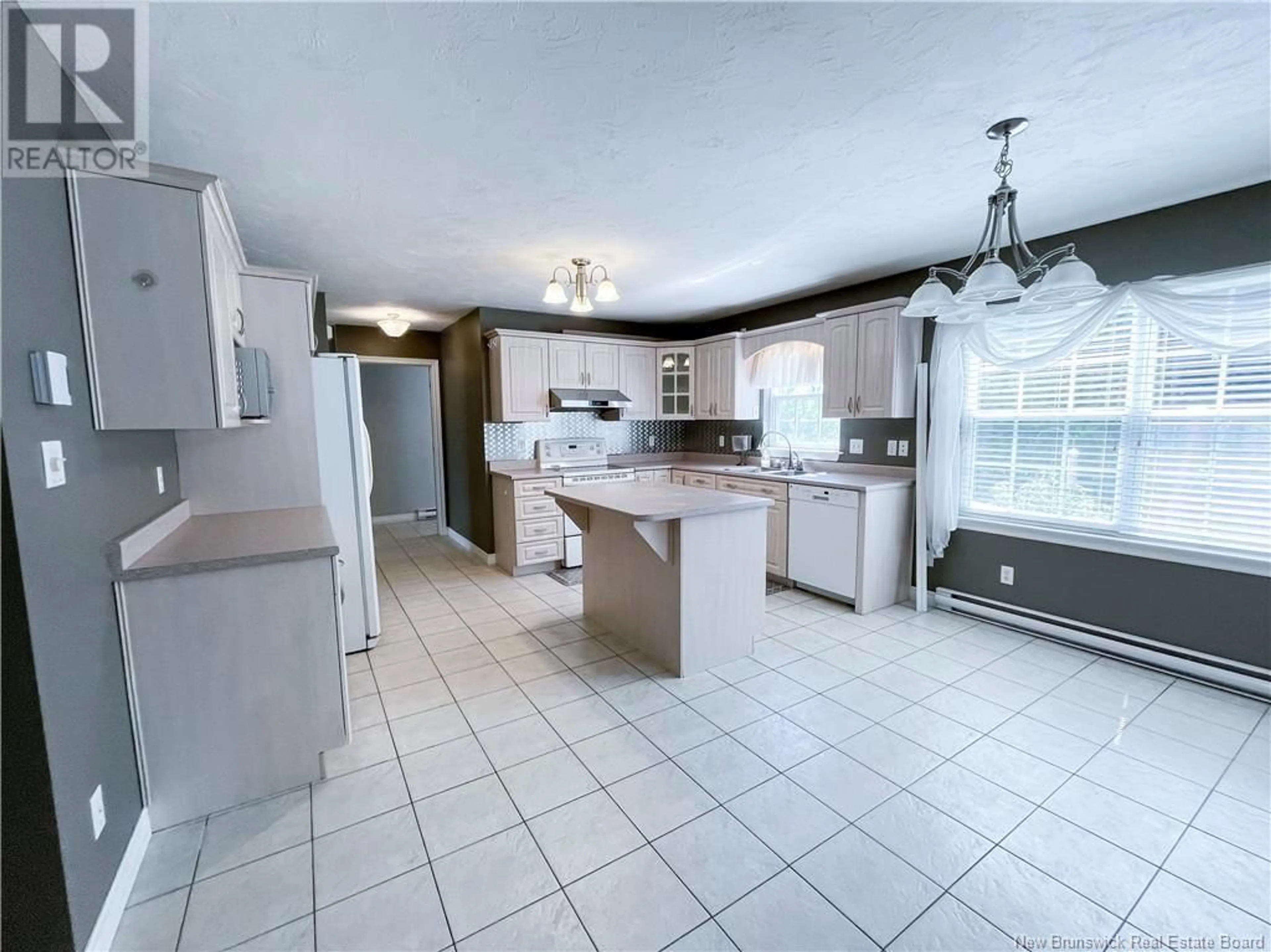 Open concept kitchen, ceramic/tile floor for 64 MCANDREW STREET, Moncton New Brunswick E1G4Z3