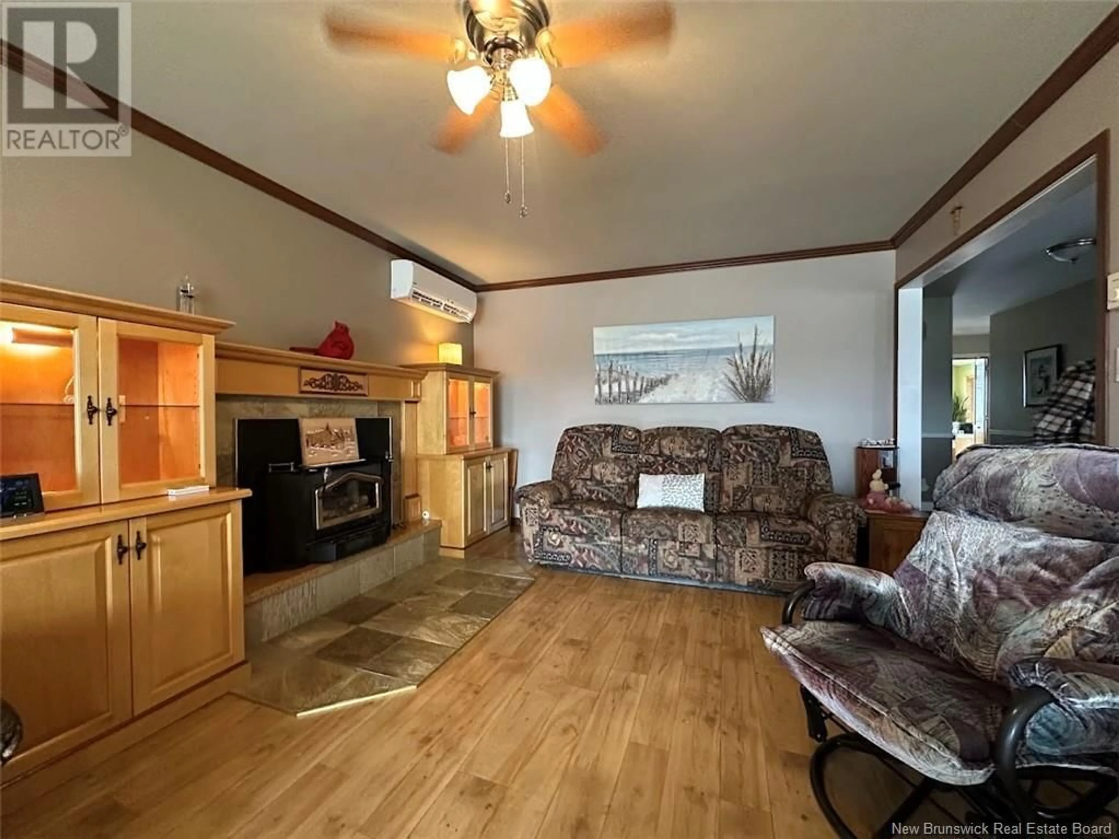 Living room with furniture, wood/laminate floor for 685 PRINCIPALE STREET, Clair New Brunswick E7A2H3