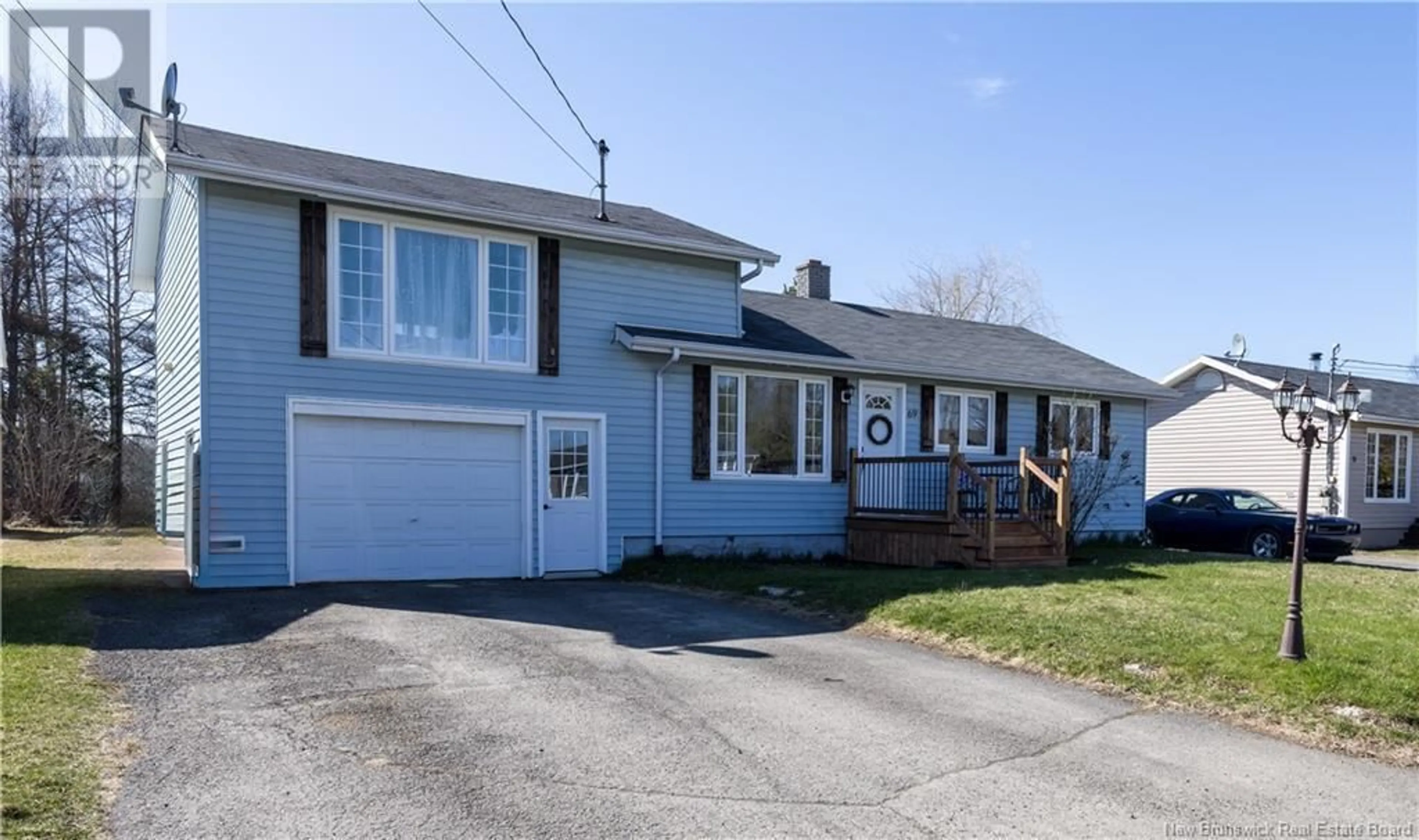 Home with vinyl exterior material, street for 69 CENTENNIAL STREET, Plaster Rock New Brunswick E7G1J1