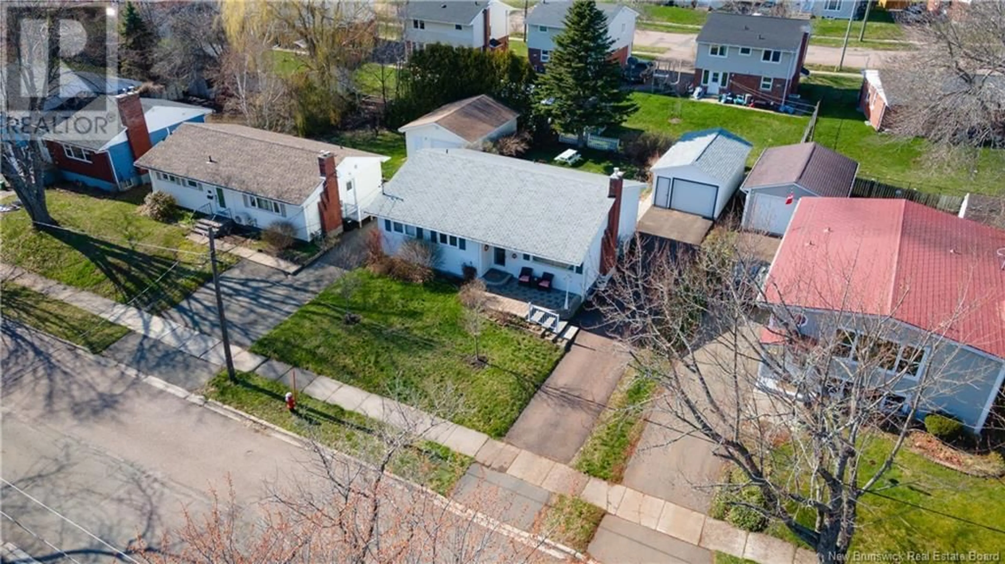 A pic from outside/outdoor area/front of a property/back of a property/a pic from drone, street for 53 MADISON, Moncton New Brunswick E1E1R5