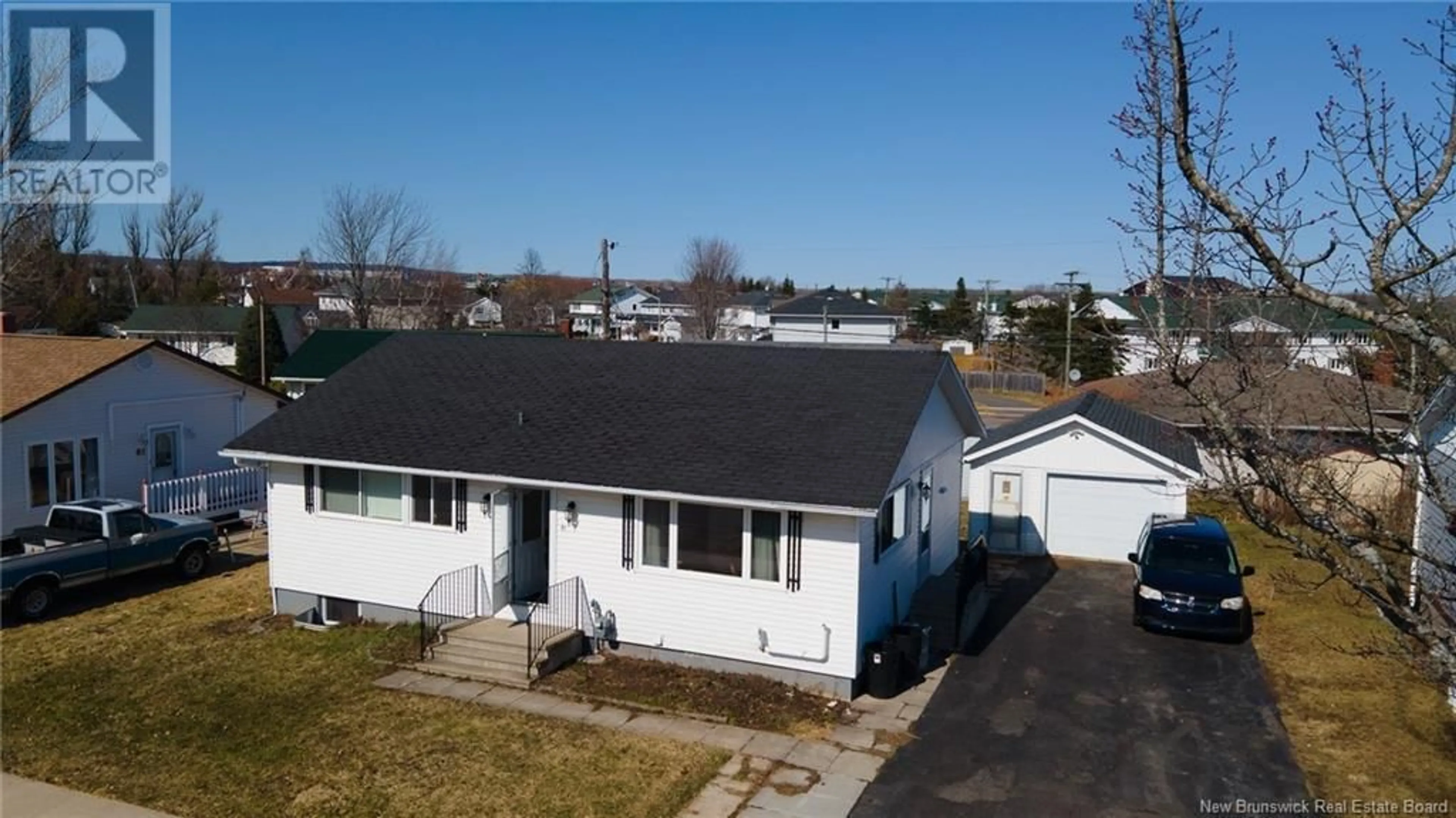 A pic from outside/outdoor area/front of a property/back of a property/a pic from drone, street for 51 WINDEMERE DRIVE, Moncton New Brunswick E1C4L2