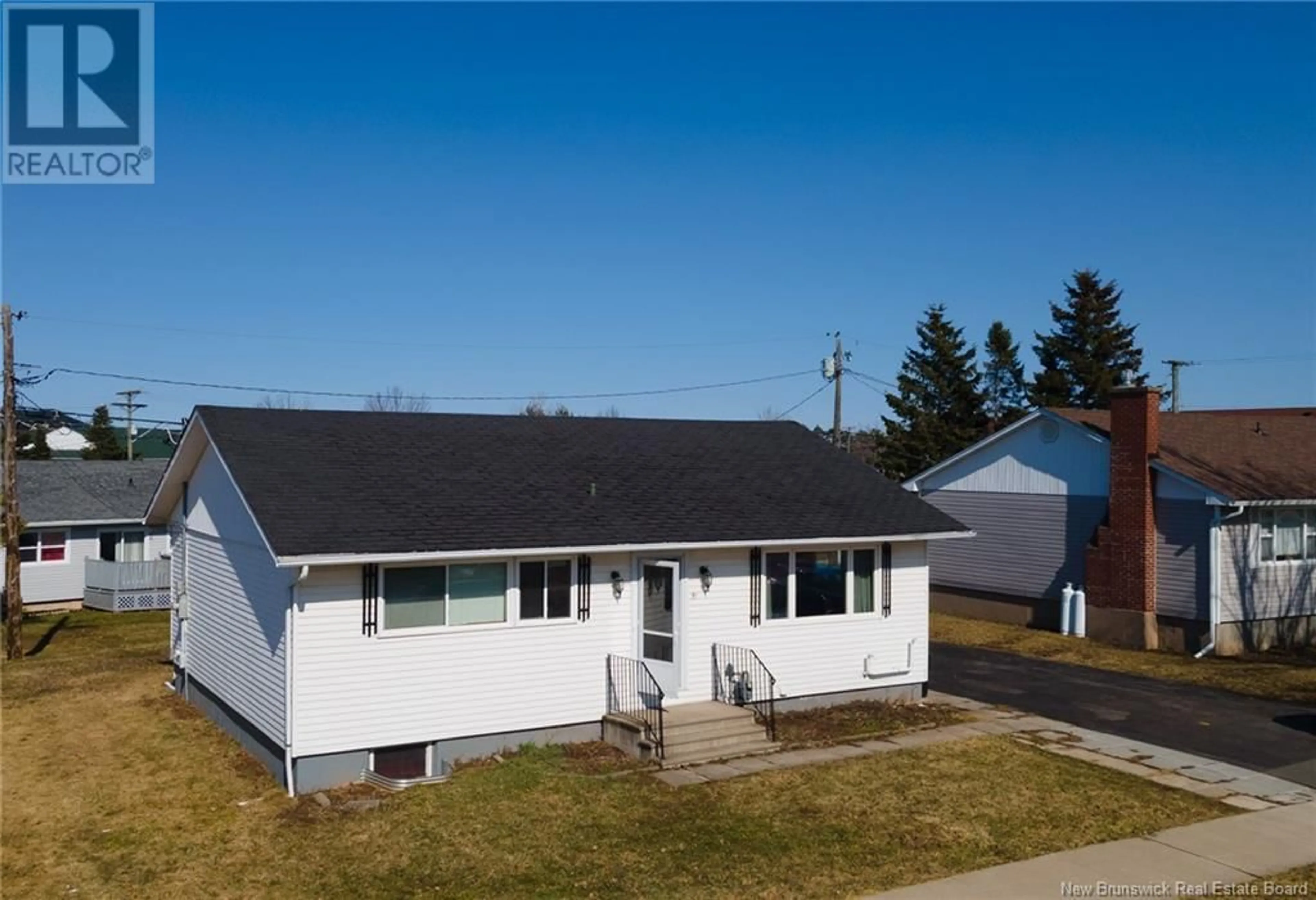 A pic from outside/outdoor area/front of a property/back of a property/a pic from drone, street for 51 WINDEMERE DRIVE, Moncton New Brunswick E1C4L2