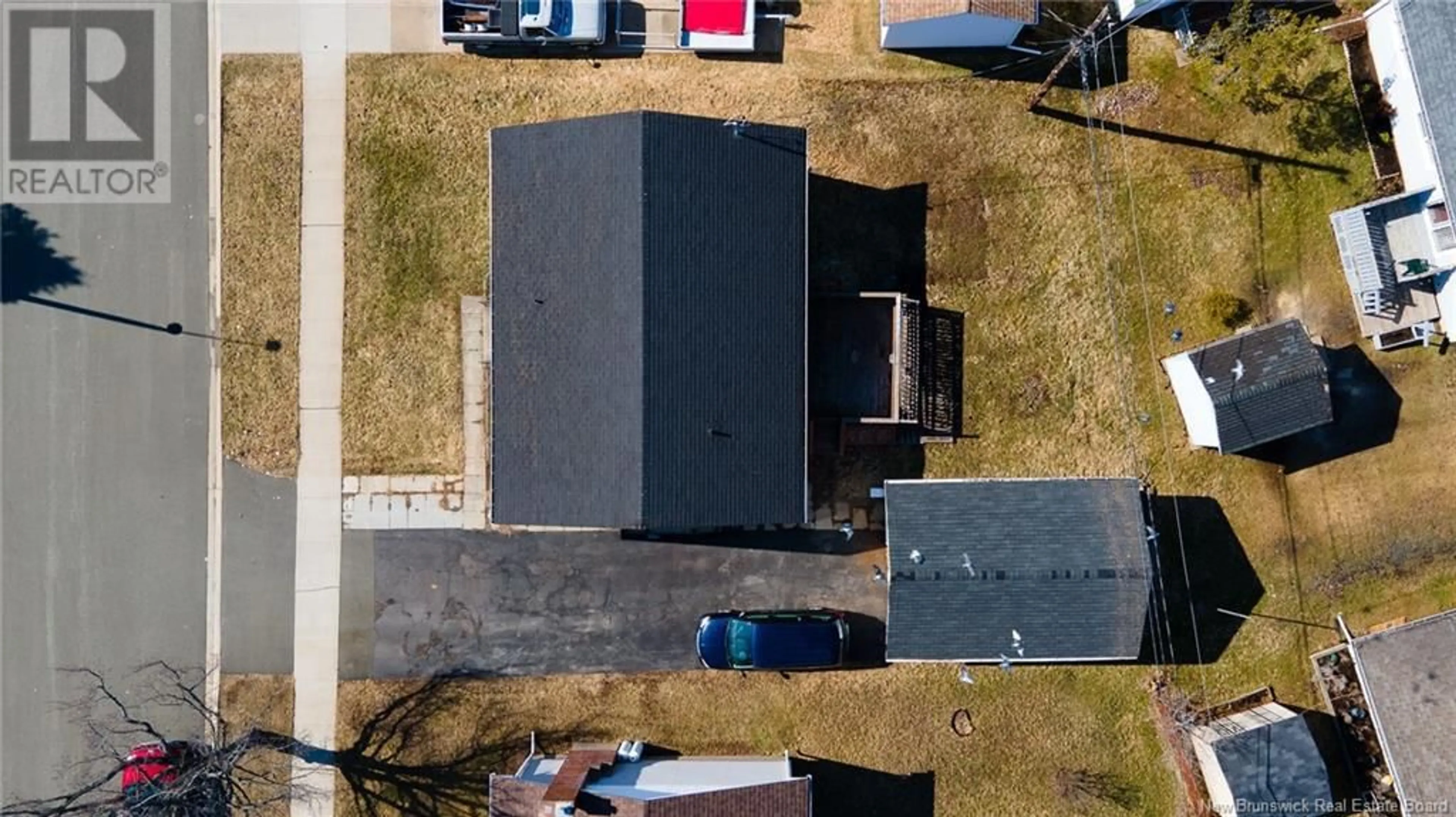 A pic from outside/outdoor area/front of a property/back of a property/a pic from drone, unknown for 51 WINDEMERE DRIVE, Moncton New Brunswick E1C4L2
