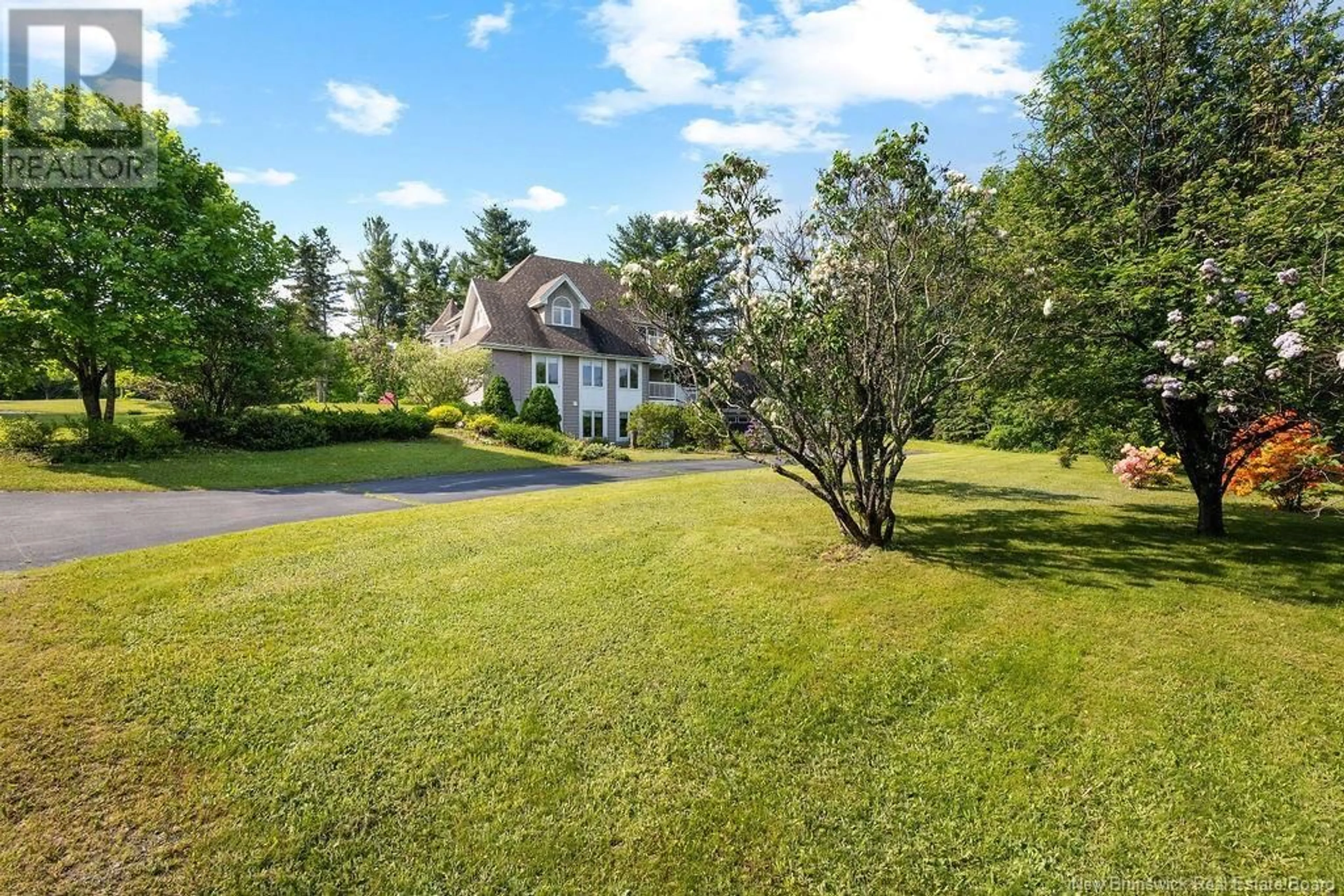A pic from outside/outdoor area/front of a property/back of a property/a pic from drone, water/lake/river/ocean view for 18 BREAU AVENUE, Miramichi New Brunswick E1N6M8