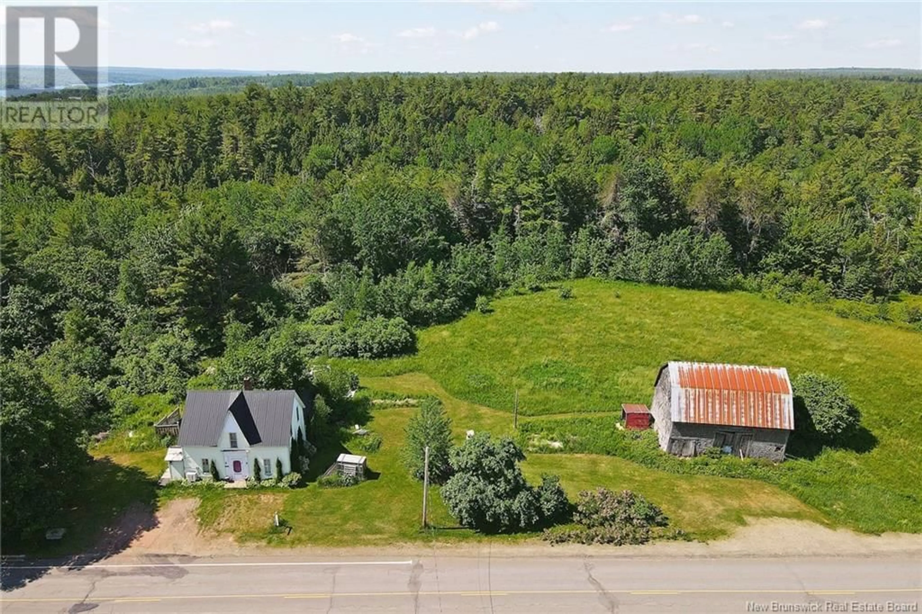 A pic from outside/outdoor area/front of a property/back of a property/a pic from drone, forest/trees view for 1210 BRIDGE DRIVE, Cambridge-Narrows New Brunswick E4C1V6