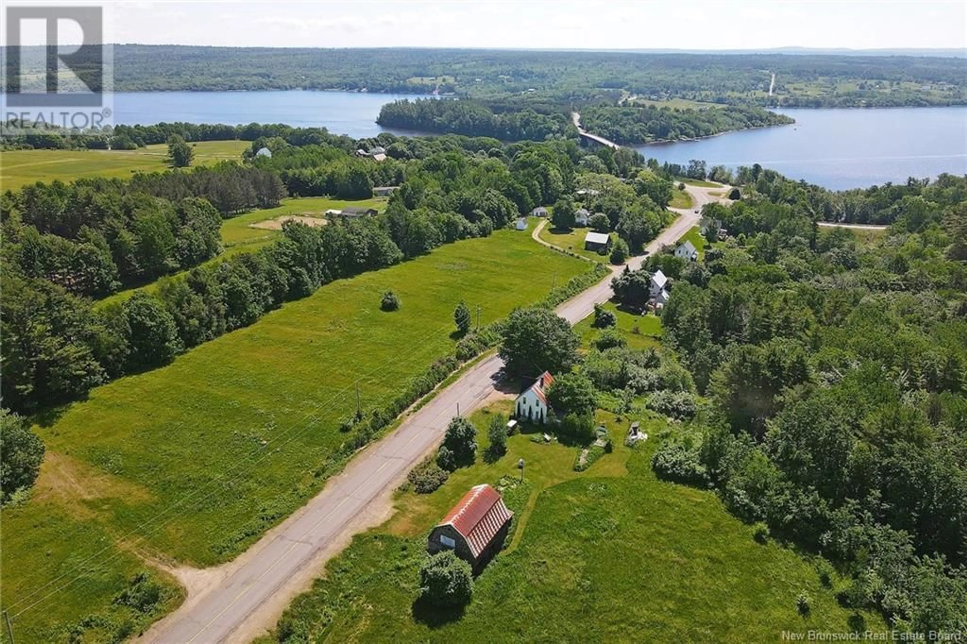 A pic from outside/outdoor area/front of a property/back of a property/a pic from drone, water/lake/river/ocean view for 1210 BRIDGE DRIVE, Cambridge-Narrows New Brunswick E4C1V6