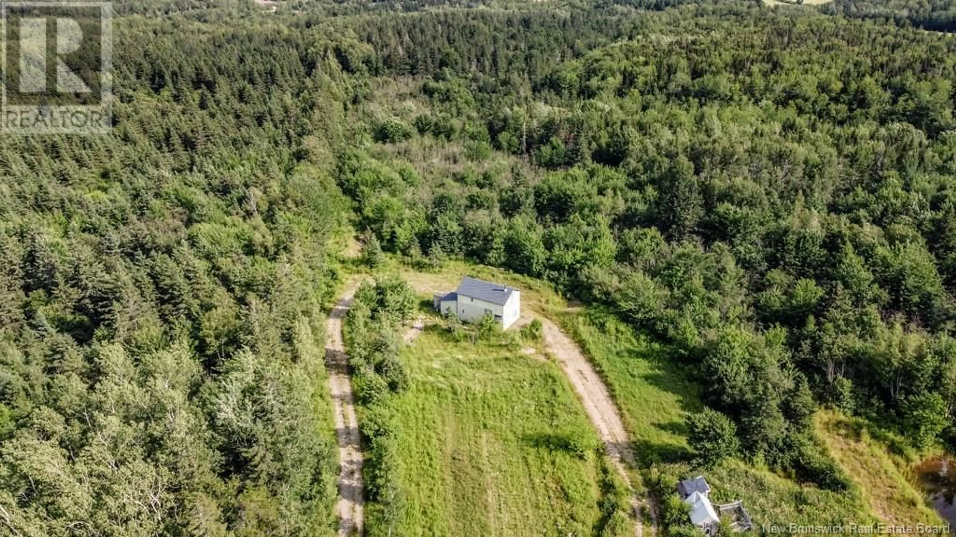 A pic from outside/outdoor area/front of a property/back of a property/a pic from drone, forest/trees view for 156 BOIS JOLI ROAD, Bouctouche New Brunswick E4S2X1