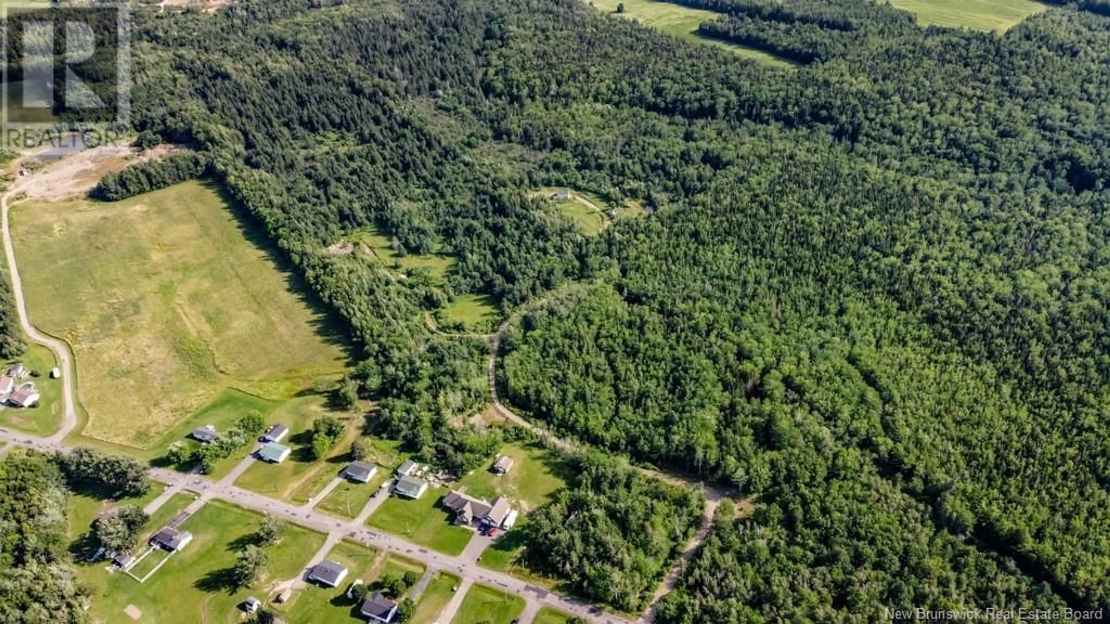 A pic from outside/outdoor area/front of a property/back of a property/a pic from drone, forest/trees view for 156 BOIS JOLI ROAD, Bouctouche New Brunswick E4S2X1