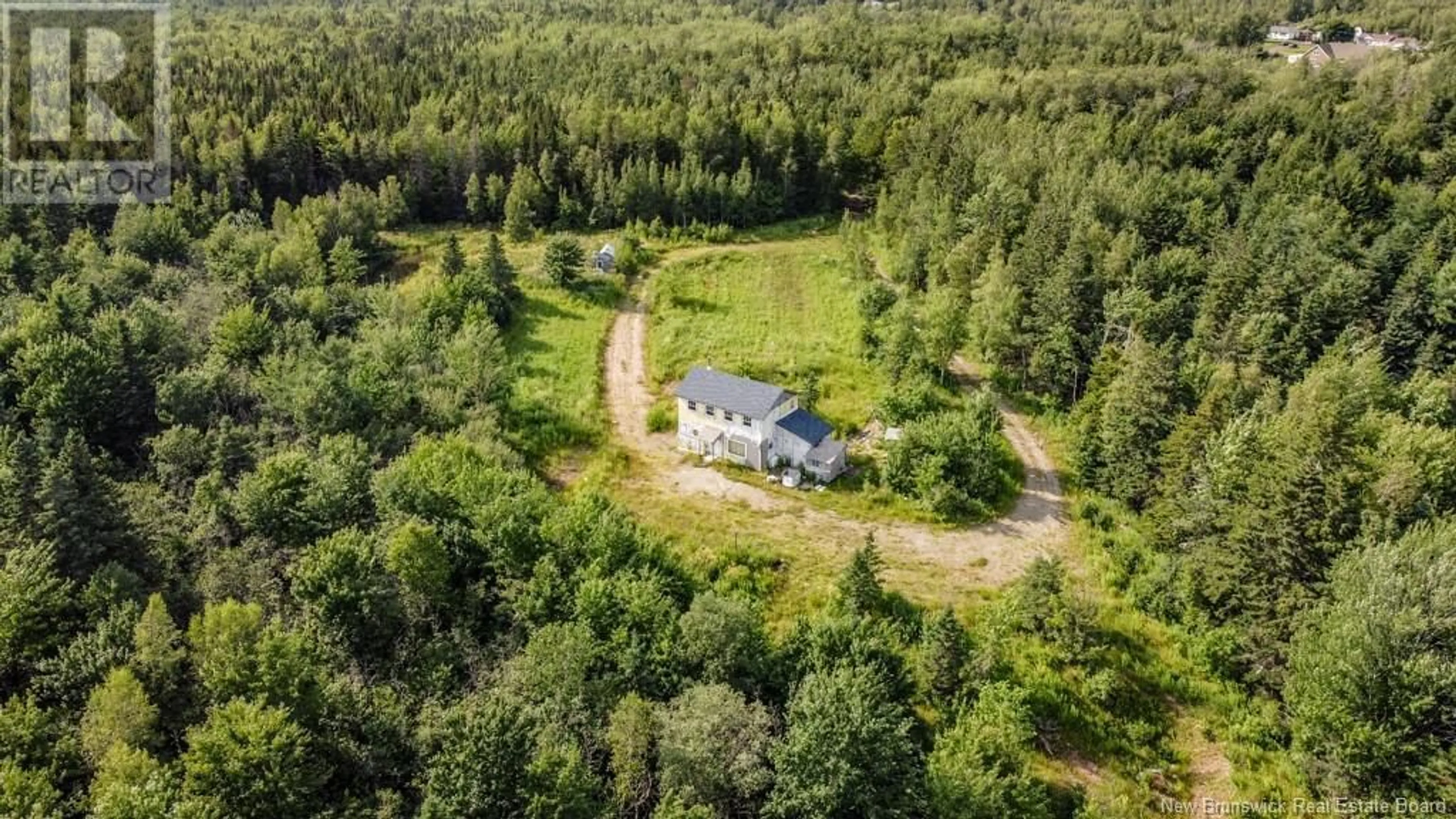 A pic from outside/outdoor area/front of a property/back of a property/a pic from drone, forest/trees view for 156 BOIS JOLI ROAD, Bouctouche New Brunswick E4S2X1