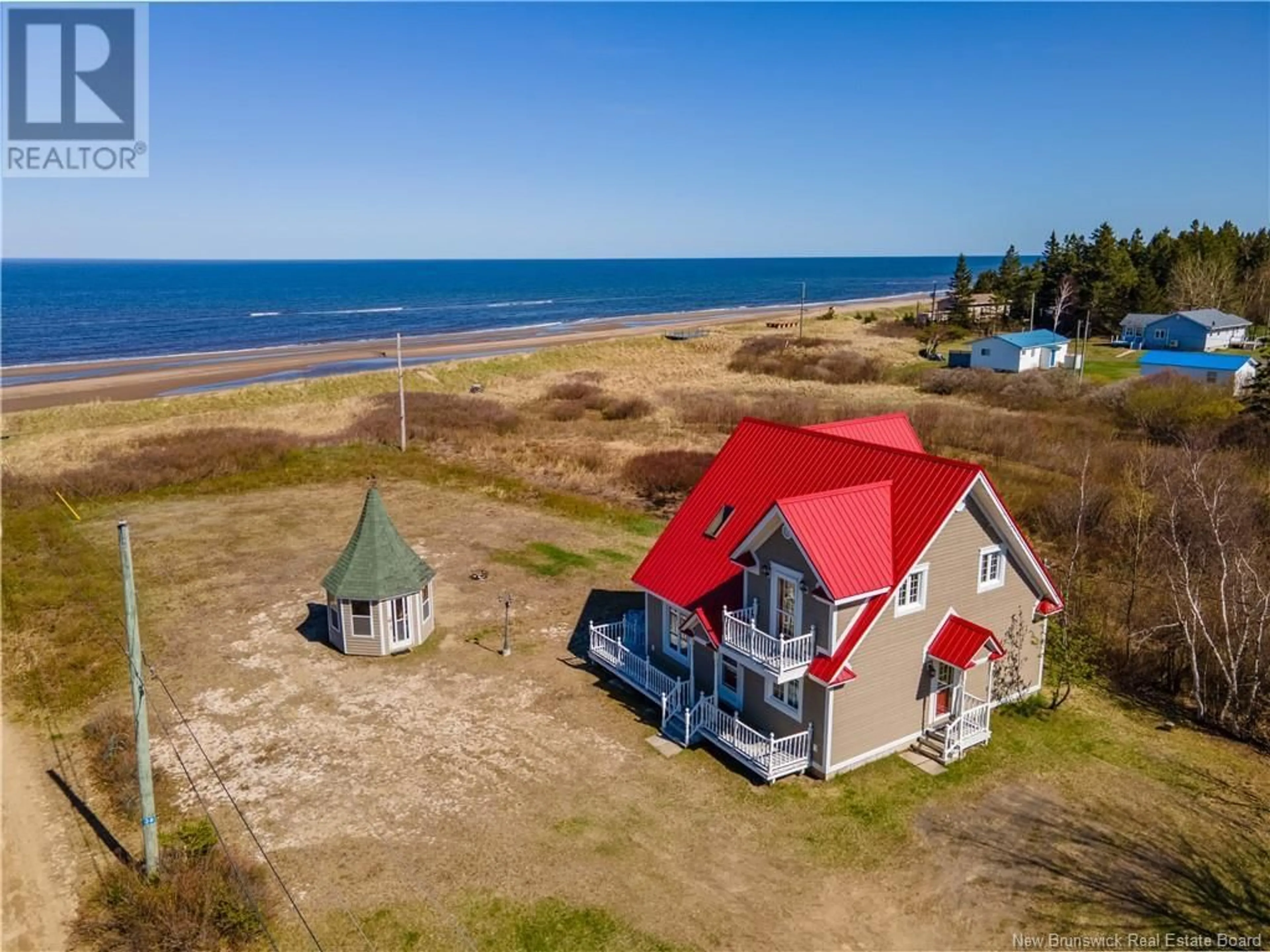 A pic from outside/outdoor area/front of a property/back of a property/a pic from drone, water/lake/river/ocean view for 38 MIRIAM LANE LANE, Bouctouche Bay New Brunswick E4S4X6