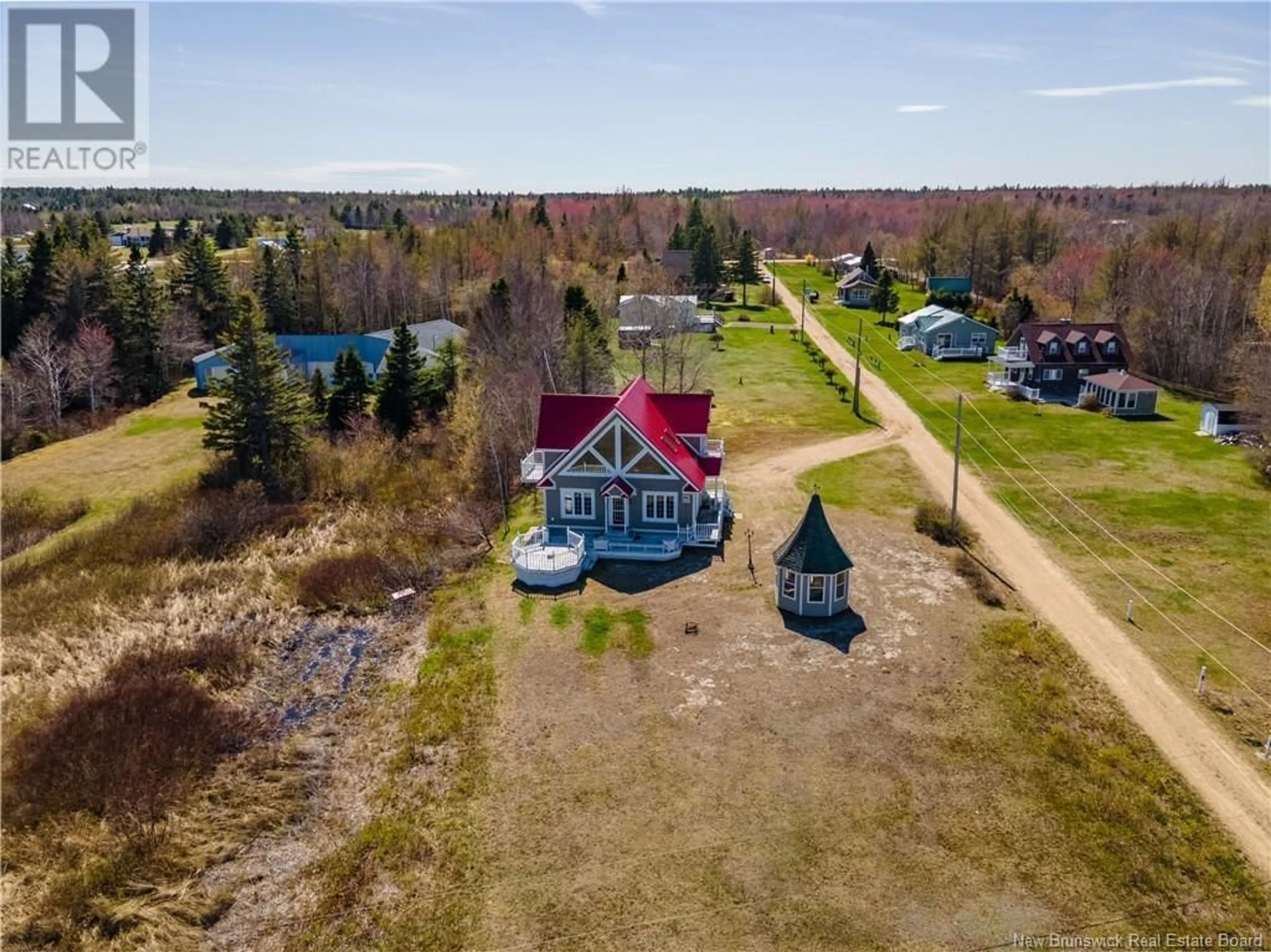 A pic from outside/outdoor area/front of a property/back of a property/a pic from drone, water/lake/river/ocean view for 38 MIRIAM LANE LANE, Bouctouche Bay New Brunswick E4S4X6