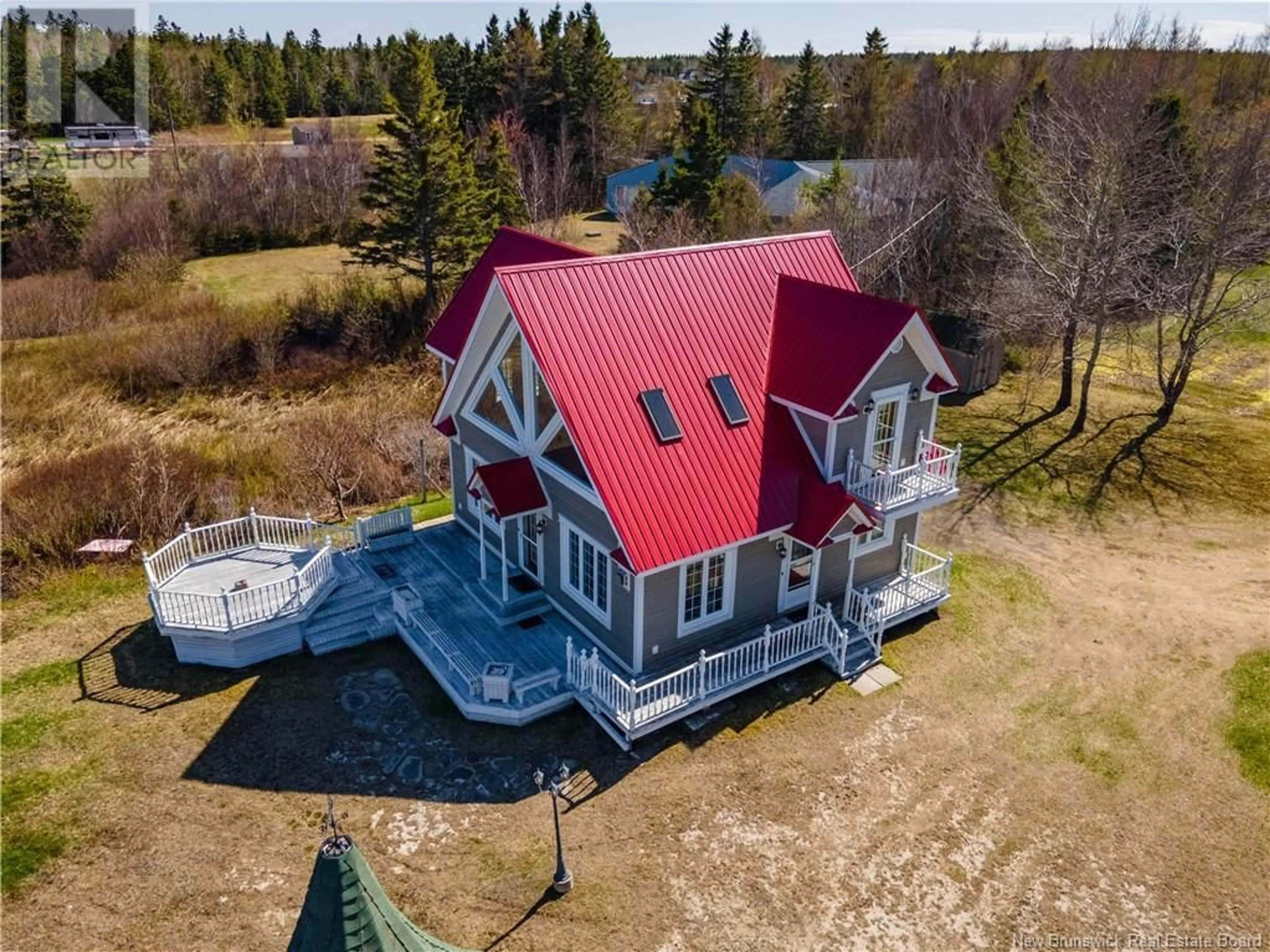 A pic from outside/outdoor area/front of a property/back of a property/a pic from drone, water/lake/river/ocean view for 38 MIRIAM LANE LANE, Bouctouche Bay New Brunswick E4S4X6