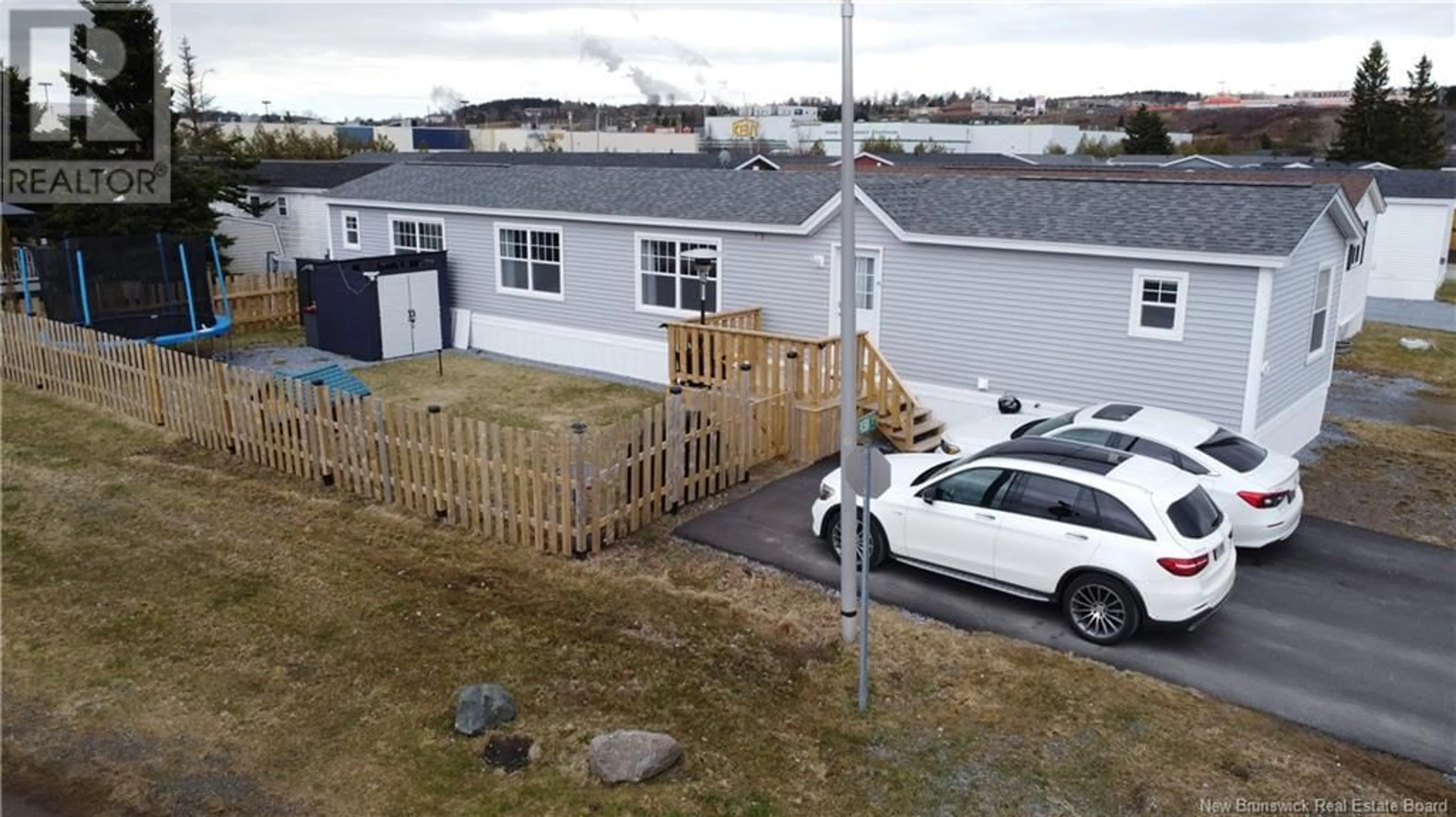 A pic from outside/outdoor area/front of a property/back of a property/a pic from drone, street for 1 ROBIN COURT, Saint John New Brunswick E2J3Y7