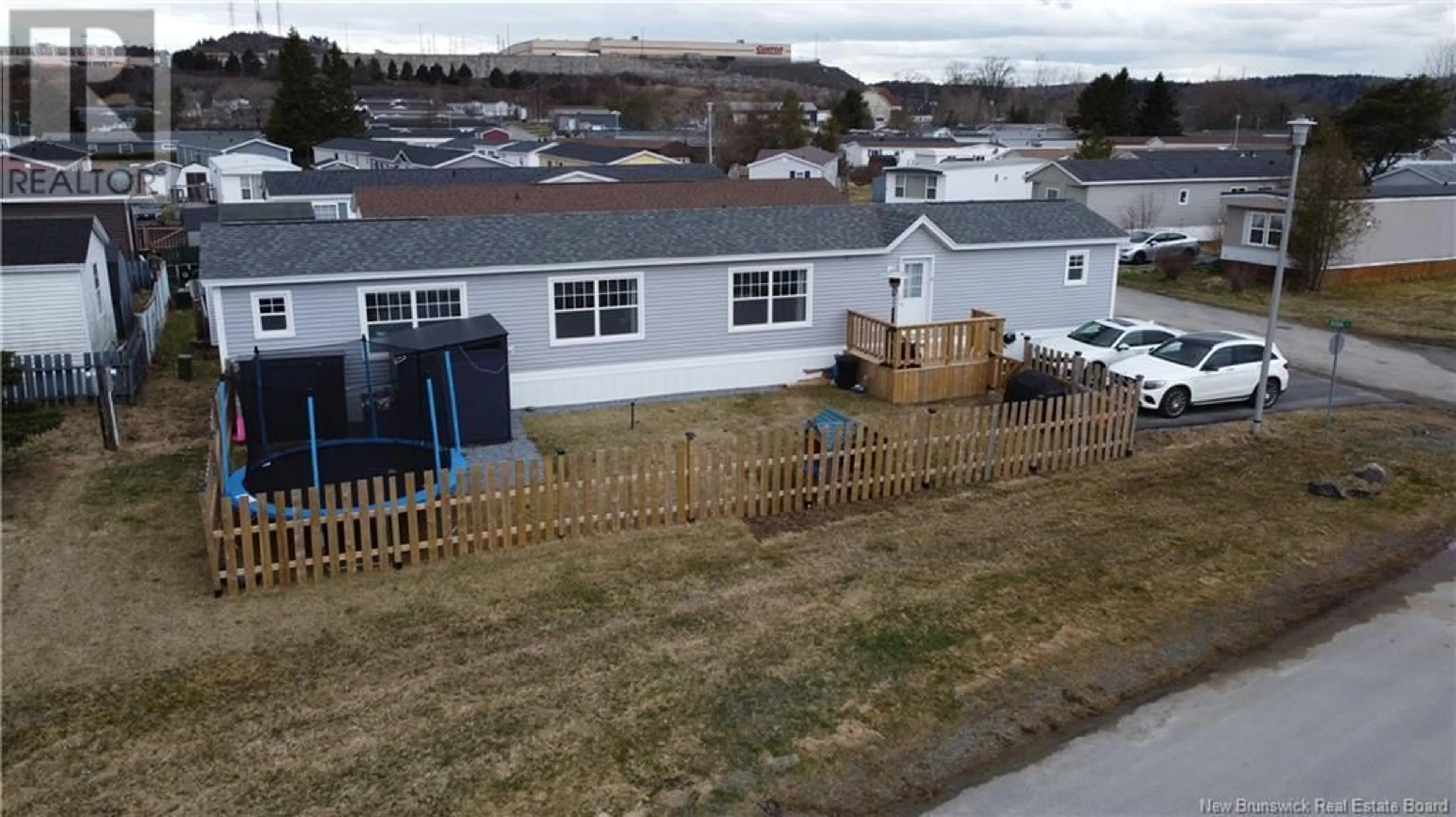 A pic from outside/outdoor area/front of a property/back of a property/a pic from drone, mountain view for 1 ROBIN COURT, Saint John New Brunswick E2J3Y7