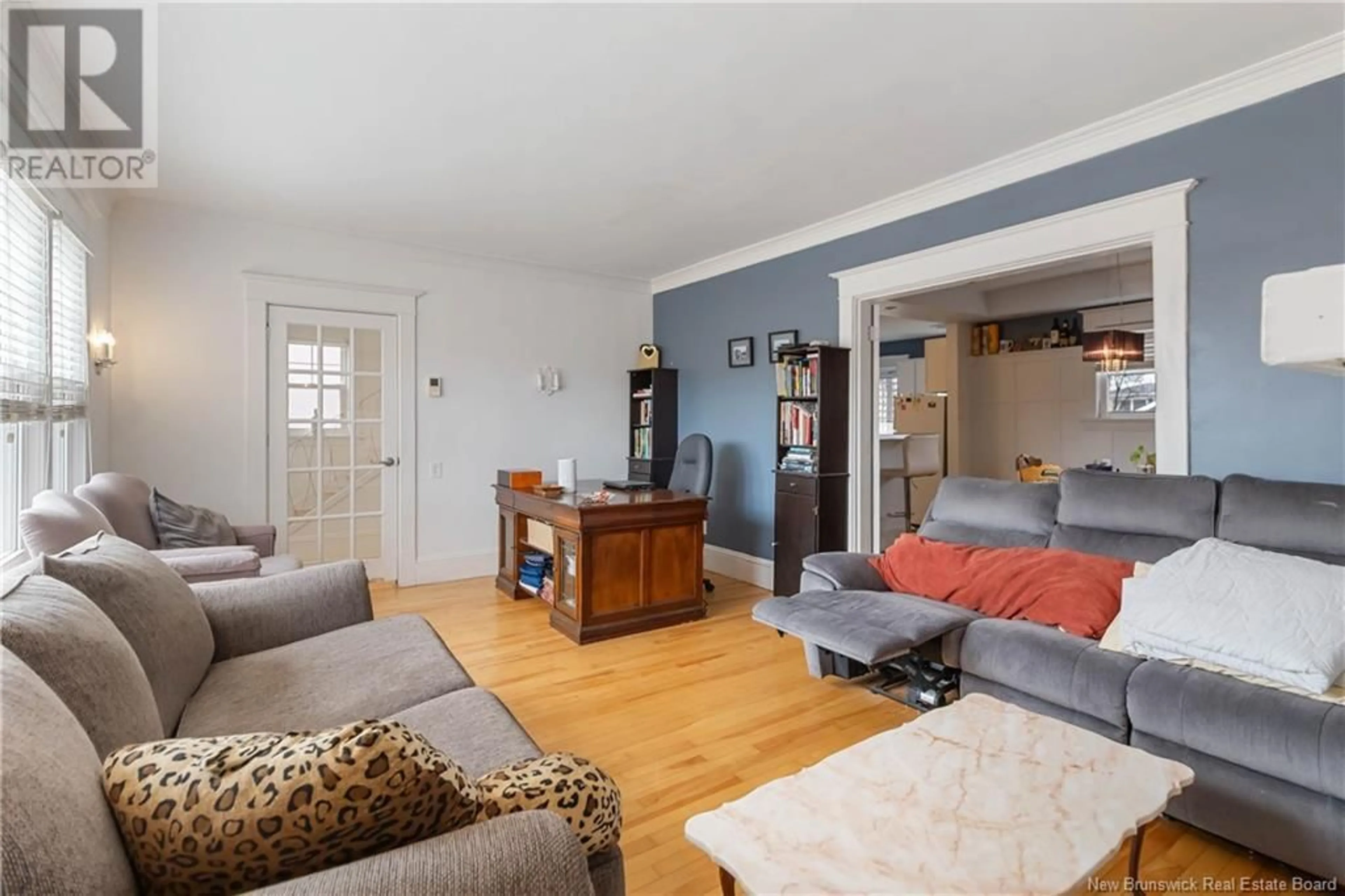Living room with furniture, wood/laminate floor for 360-362 CAMERON STREET, Moncton New Brunswick E1C5Z6
