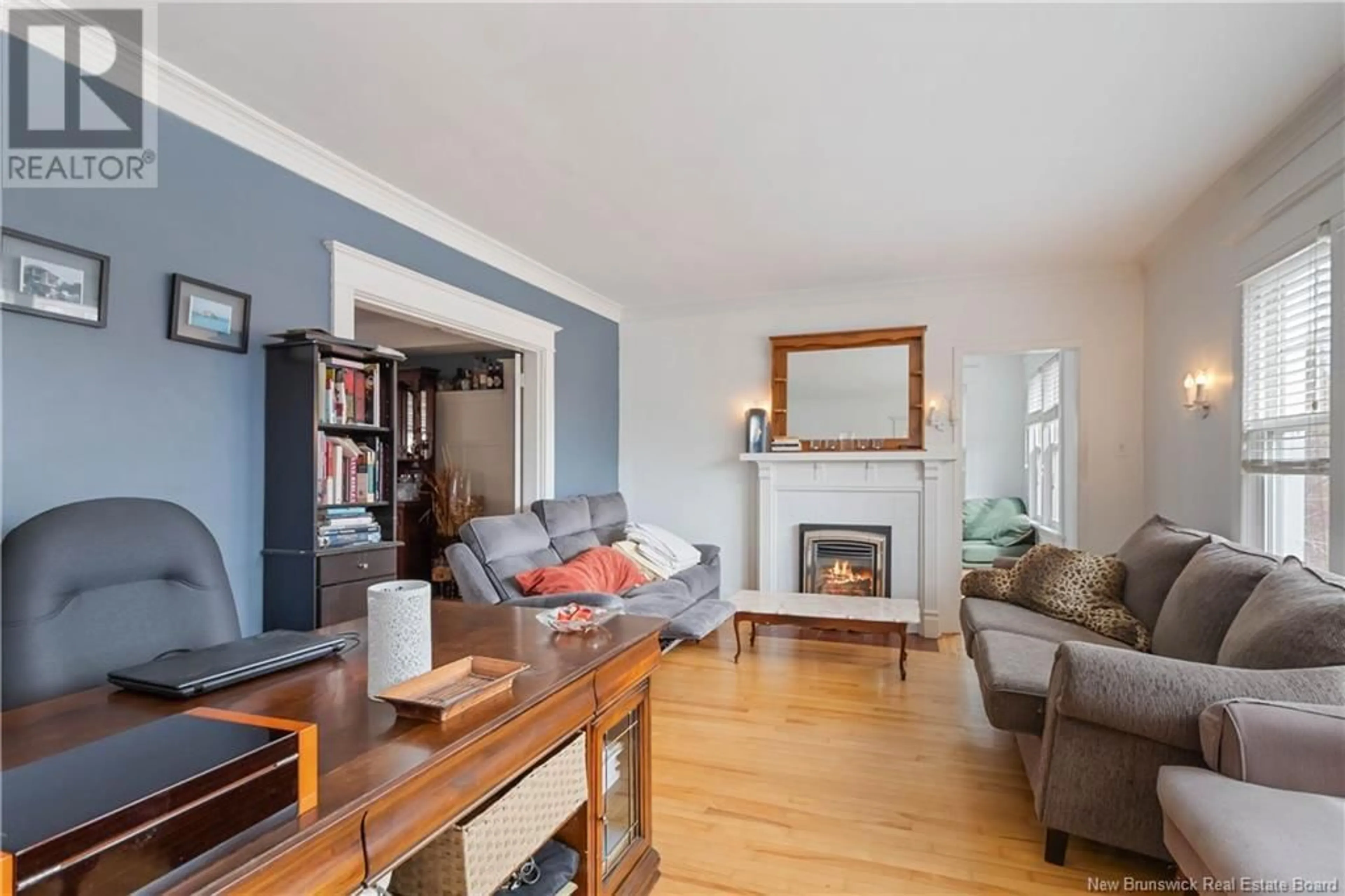 Living room with furniture, wood/laminate floor for 360-362 CAMERON STREET, Moncton New Brunswick E1C5Z6