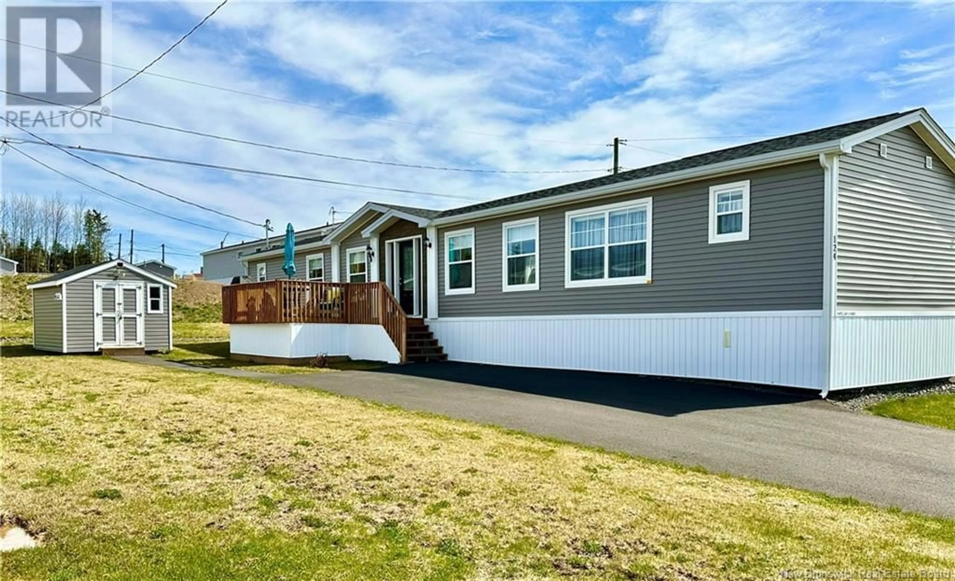 Home with vinyl exterior material, street for 124 BURNS STREET, Fredericton New Brunswick E3G4C8