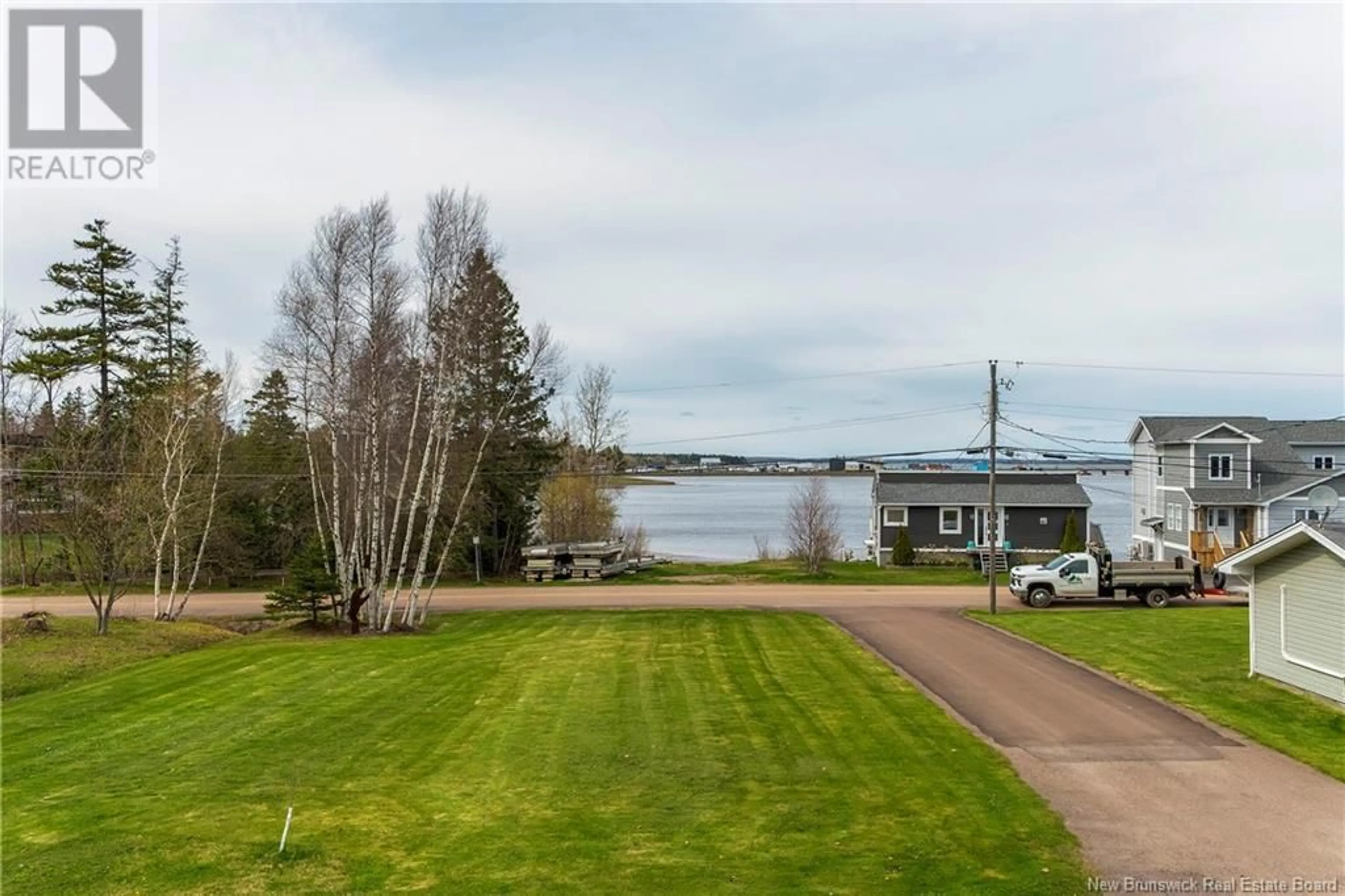 A pic from outside/outdoor area/front of a property/back of a property/a pic from drone, water/lake/river/ocean view for 355 CORNWALL POINT ROAD, Shediac New Brunswick E4P1N9