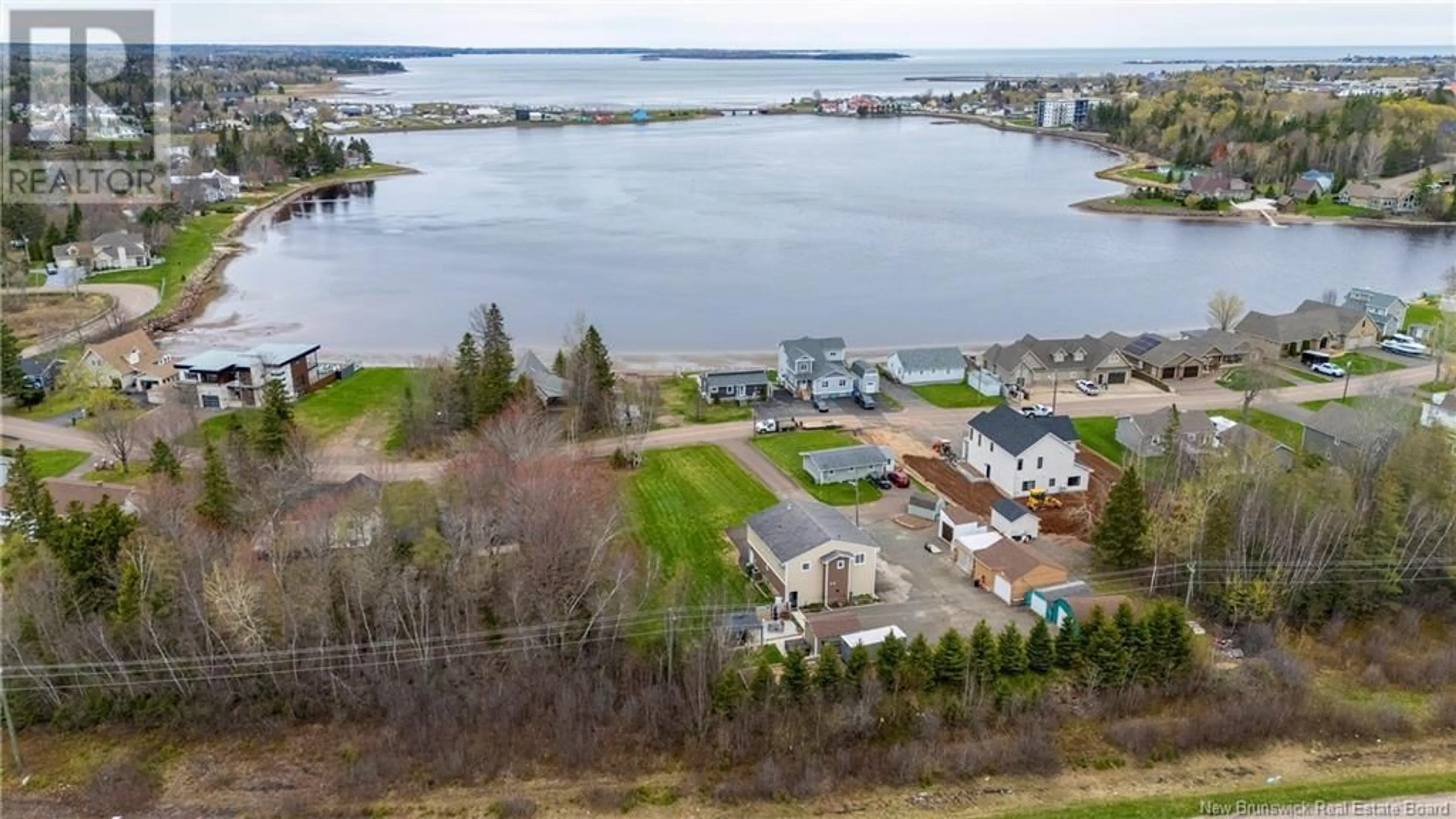 A pic from outside/outdoor area/front of a property/back of a property/a pic from drone, water/lake/river/ocean view for 355 CORNWALL POINT ROAD, Shediac New Brunswick E4P1N9