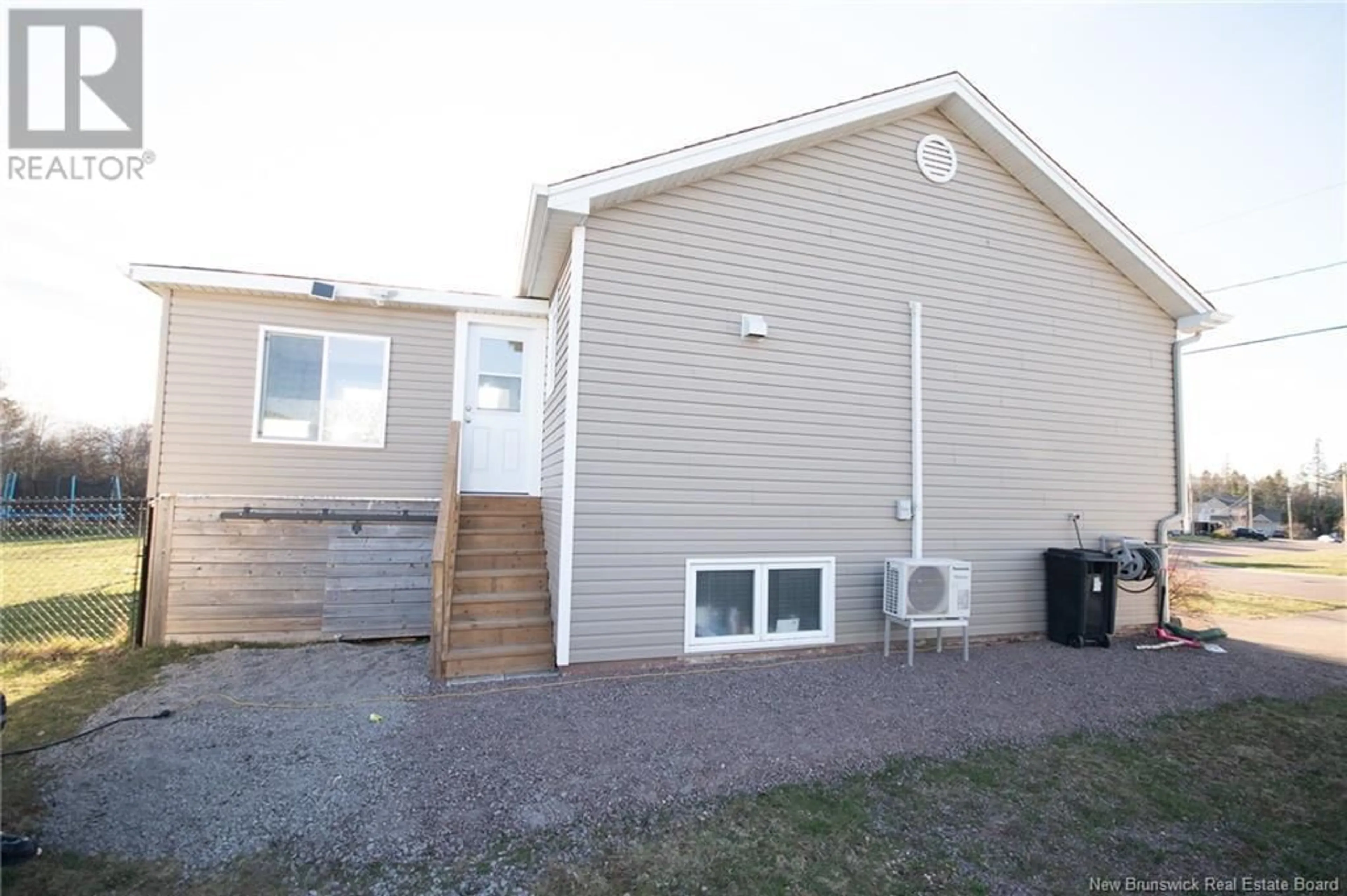 Home with vinyl exterior material, street for 63 TILMON CRESCENT, Dieppe New Brunswick E1A5S3