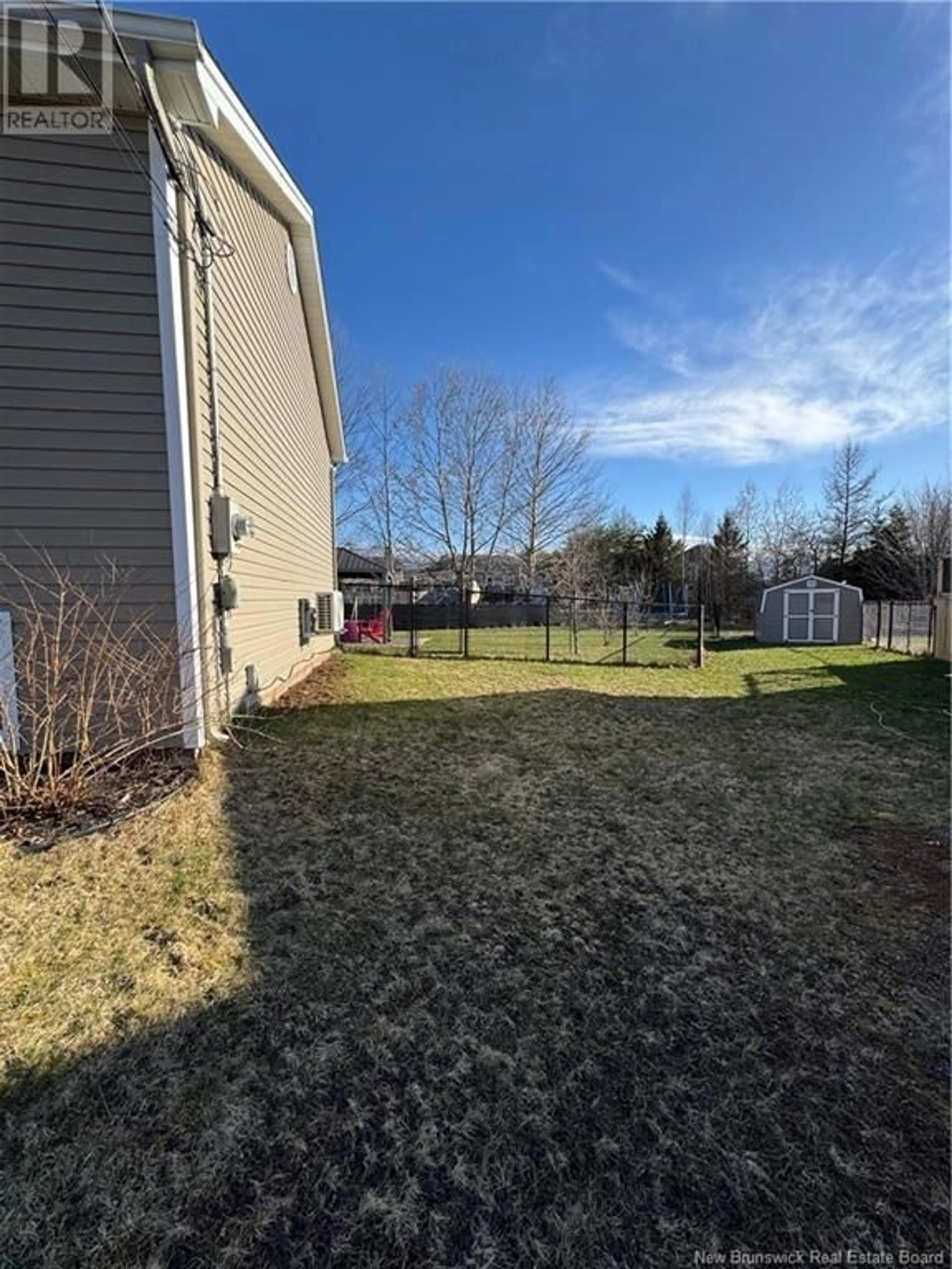 A pic from outside/outdoor area/front of a property/back of a property/a pic from drone, unknown for 63 TILMON CRESCENT, Dieppe New Brunswick E1A5S3