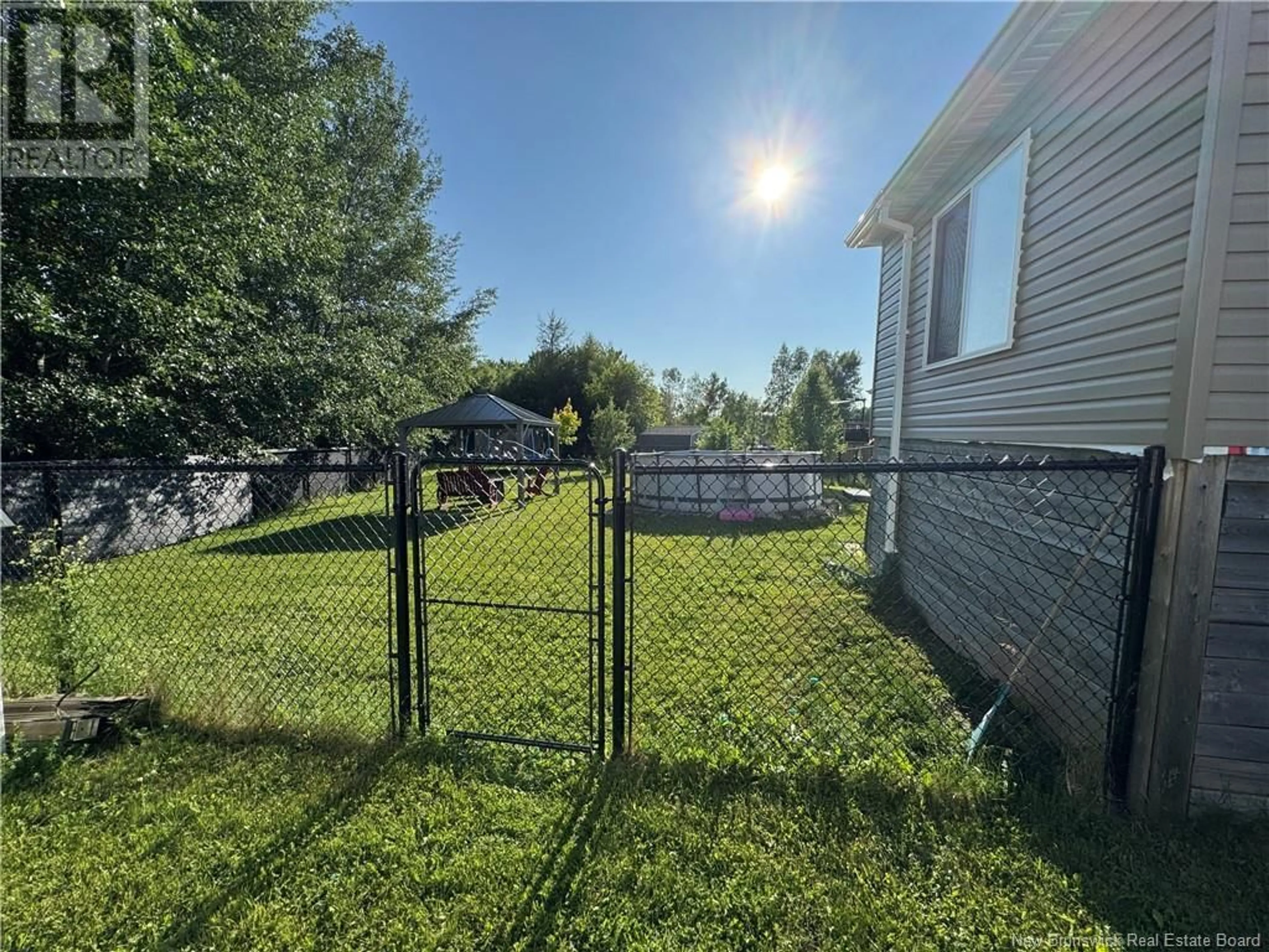 A pic from outside/outdoor area/front of a property/back of a property/a pic from drone, unknown for 63 TILMON CRESCENT, Dieppe New Brunswick E1A5S3