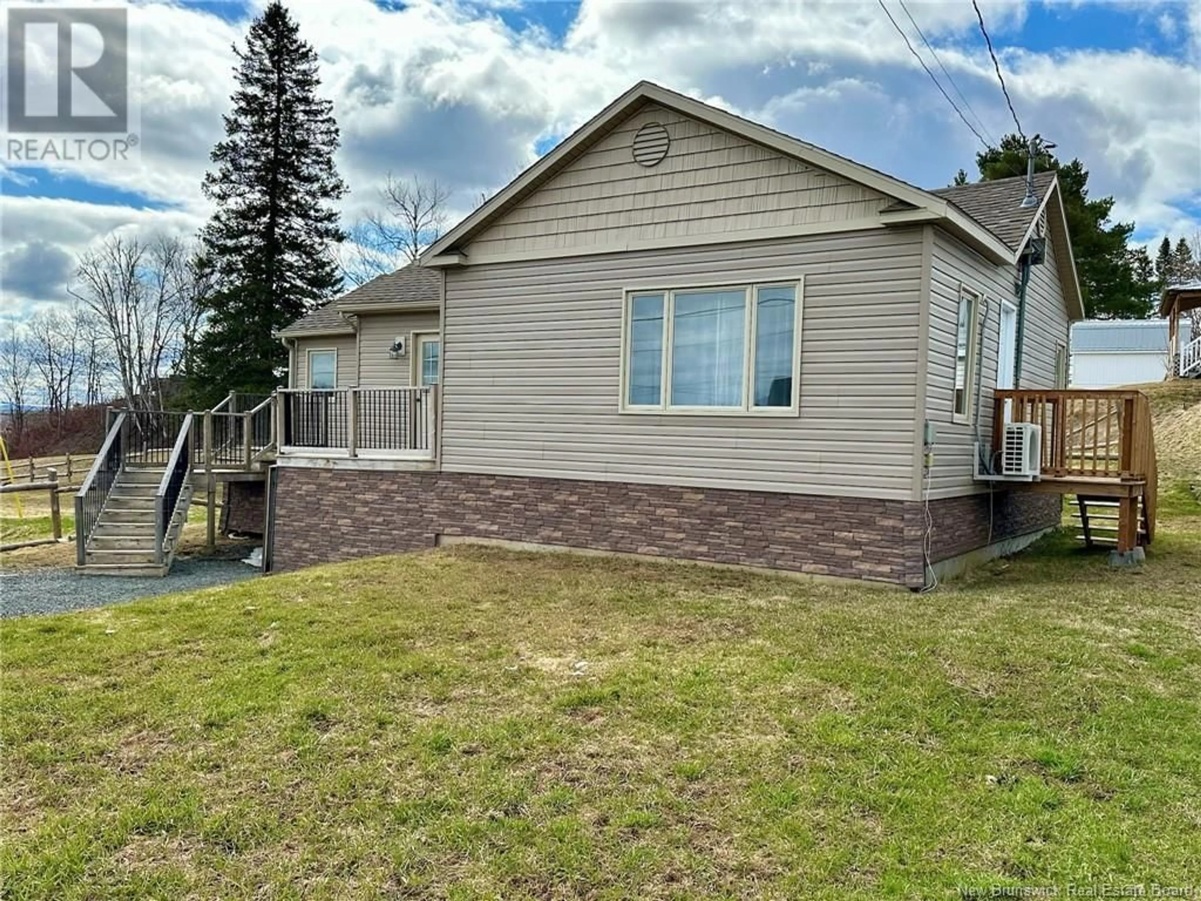 Home with vinyl exterior material, street for 31 DAYE STREET, Plaster Rock New Brunswick E7G1L2