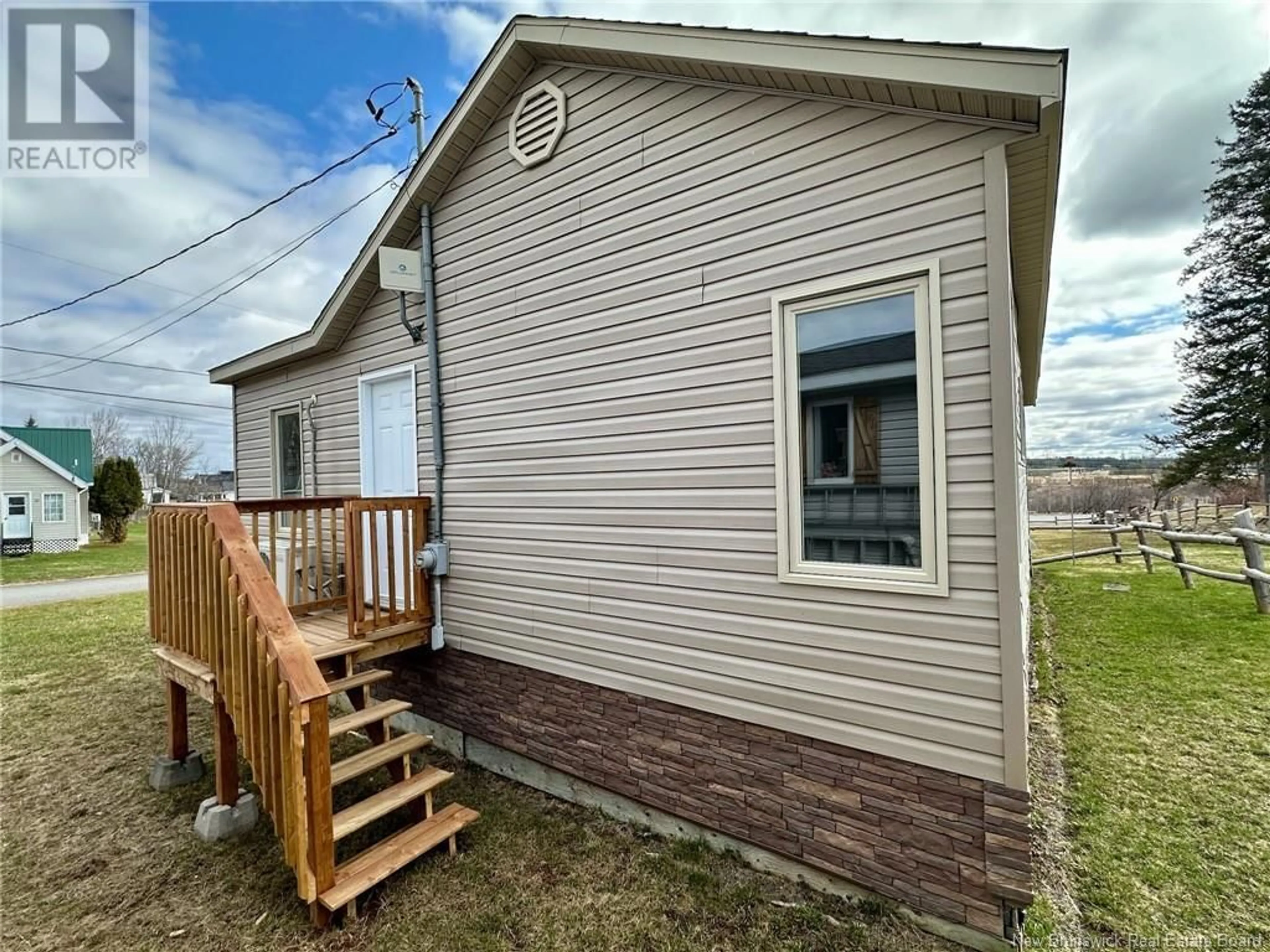 Home with vinyl exterior material, building for 31 DAYE STREET, Plaster Rock New Brunswick E7G1L2