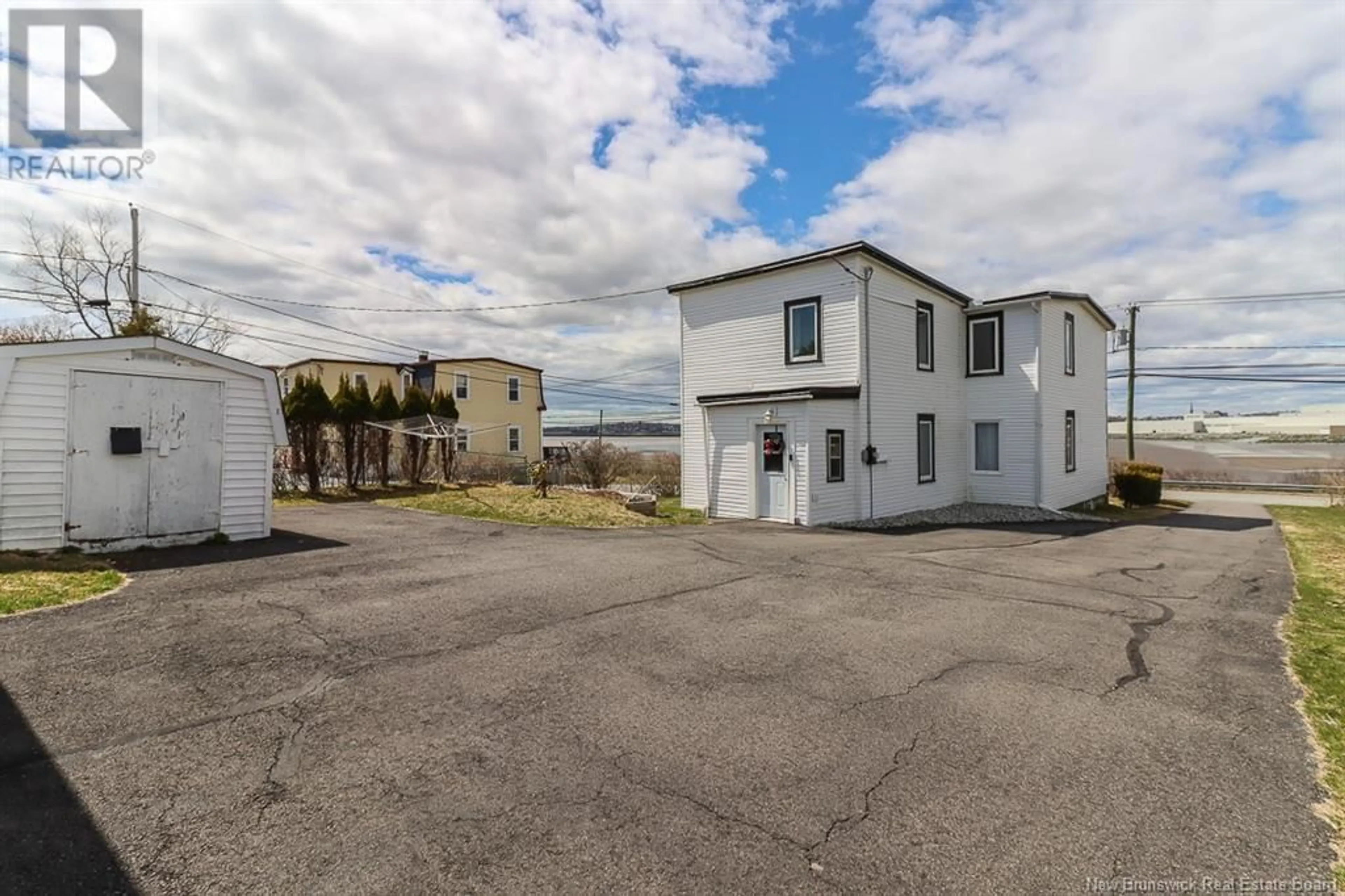 A pic from outside/outdoor area/front of a property/back of a property/a pic from drone, building for 139 RED HEAD ROAD, Saint John New Brunswick E2P1K8