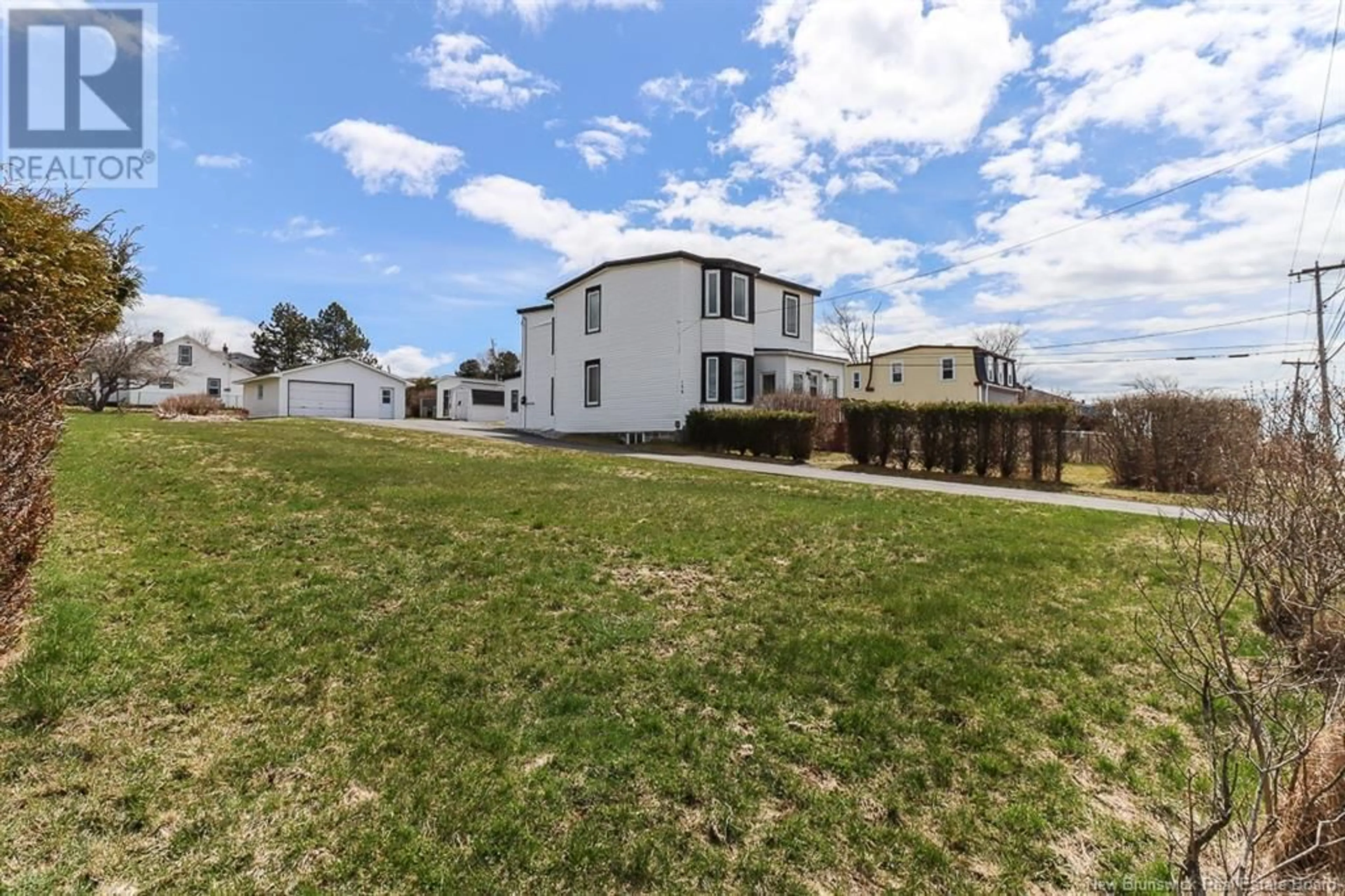 A pic from outside/outdoor area/front of a property/back of a property/a pic from drone, unknown for 139 RED HEAD ROAD, Saint John New Brunswick E2P1K8