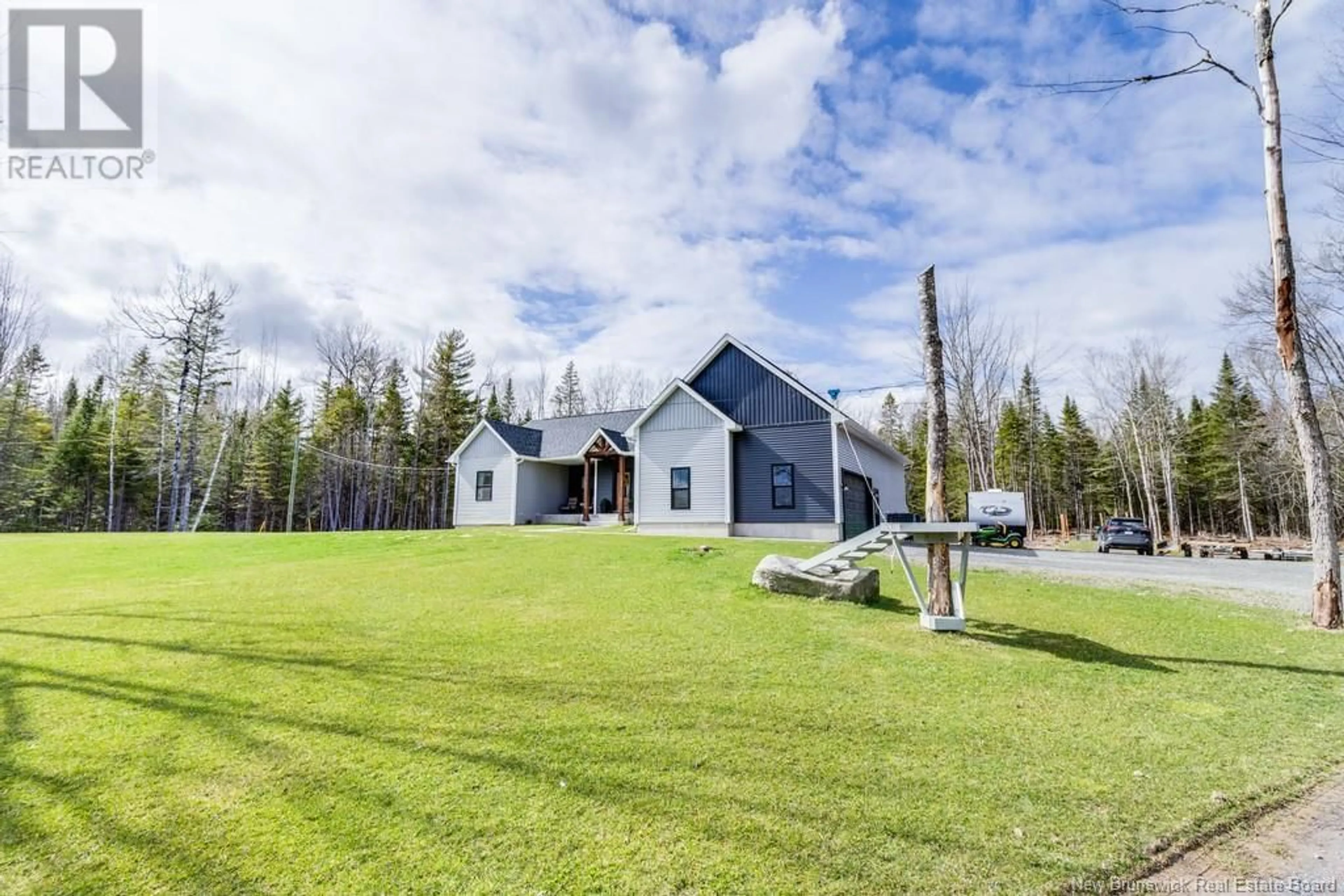 A pic from outside/outdoor area/front of a property/back of a property/a pic from drone, unknown for 1086 655 ROUTE ROUTE, Waasis New Brunswick E3B8W2