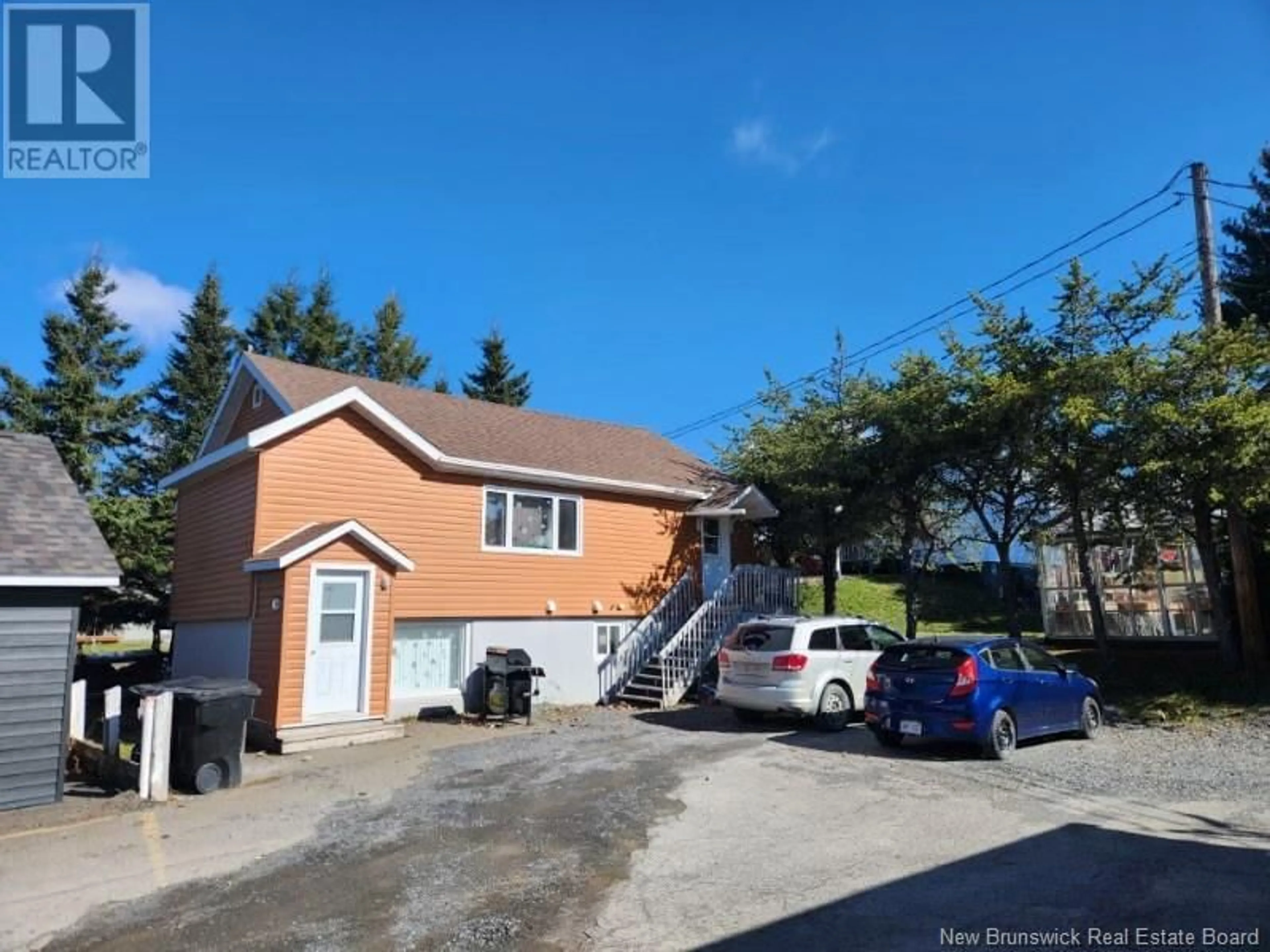 A pic from outside/outdoor area/front of a property/back of a property/a pic from drone, street for 57 TOBIQUE, Grand Falls New Brunswick E3Y1B9