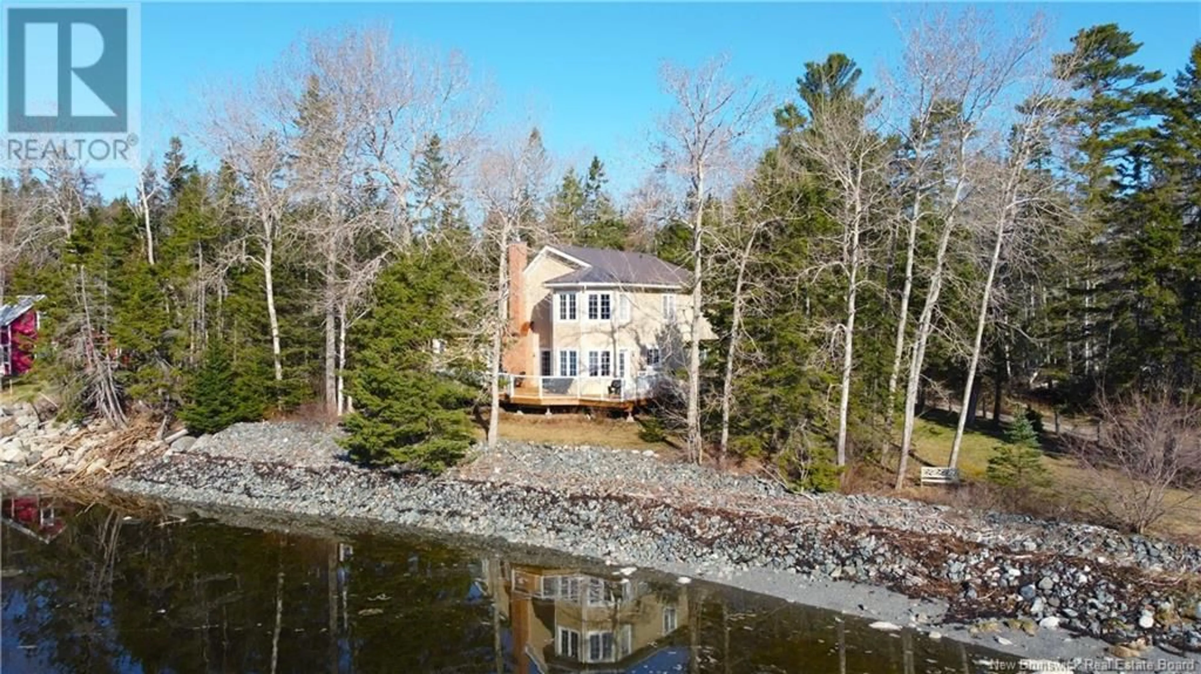 A pic from outside/outdoor area/front of a property/back of a property/a pic from drone, water/lake/river/ocean view for 38 SHORE ROAD, Oak Bay New Brunswick E3L4C6
