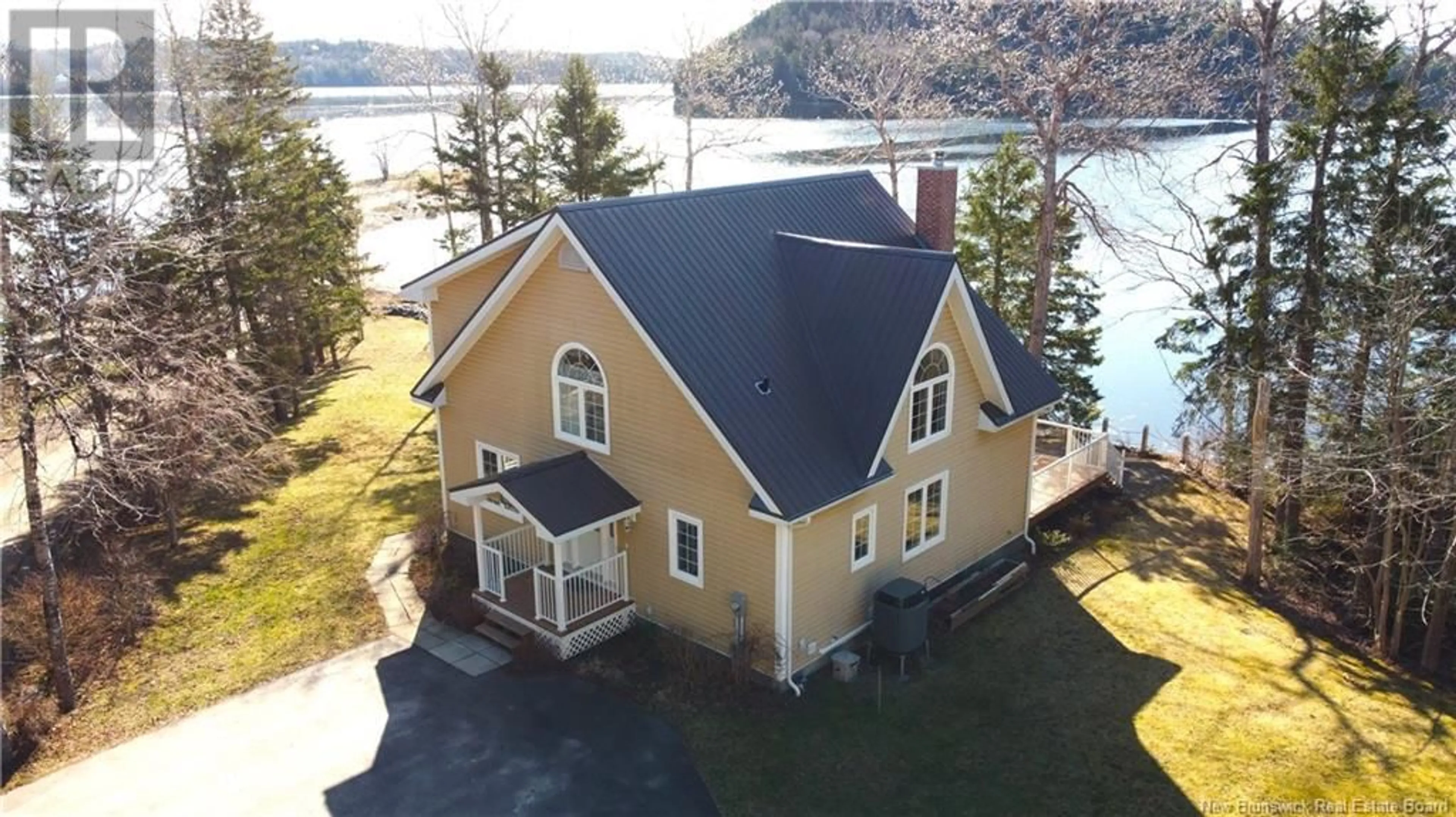 A pic from outside/outdoor area/front of a property/back of a property/a pic from drone, water/lake/river/ocean view for 38 SHORE ROAD, Oak Bay New Brunswick E3L4C6