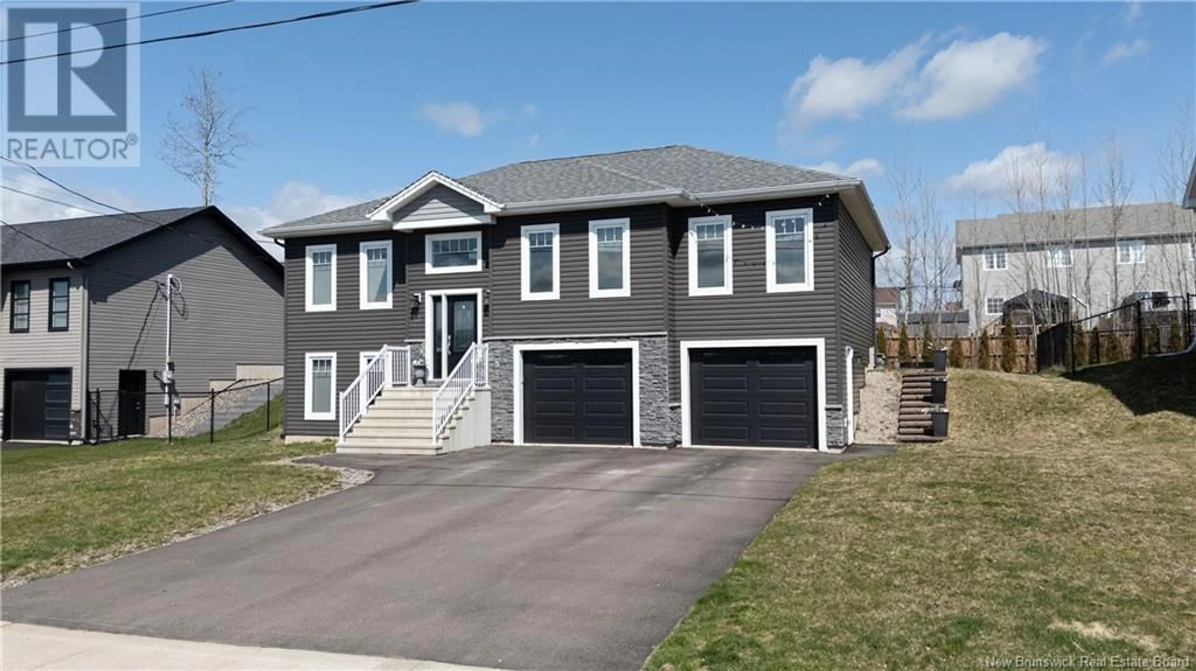 Home with vinyl exterior material, street for 63 SAMSON STREET, Moncton New Brunswick E1G5X2