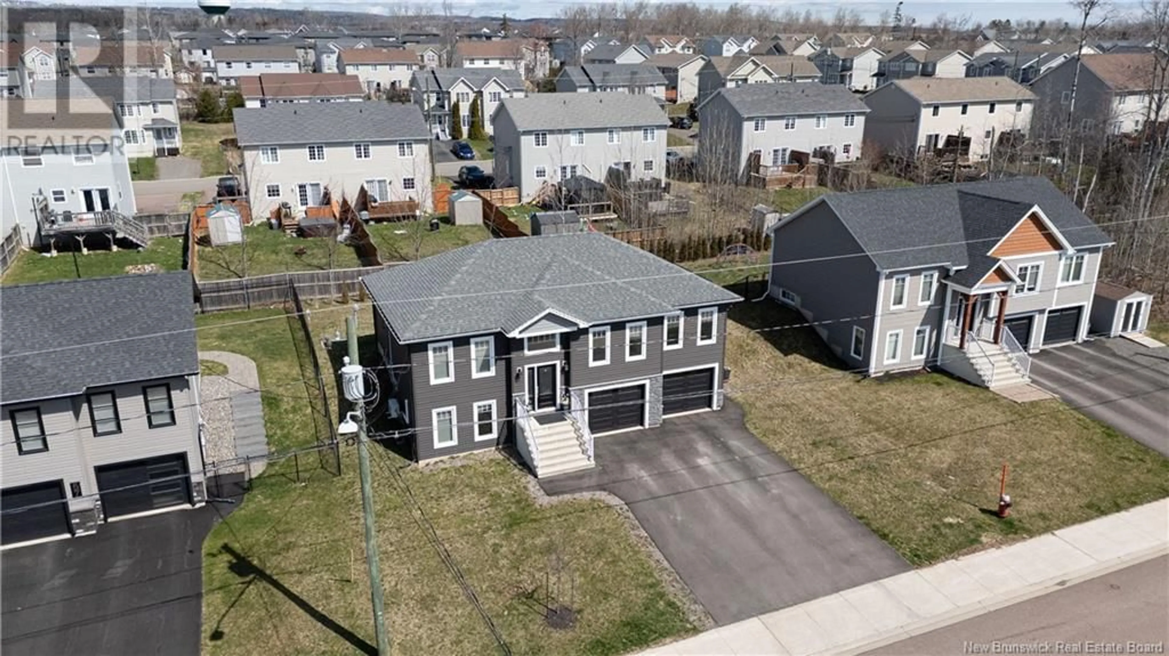 A pic from outside/outdoor area/front of a property/back of a property/a pic from drone, street for 63 SAMSON STREET, Moncton New Brunswick E1G5X2