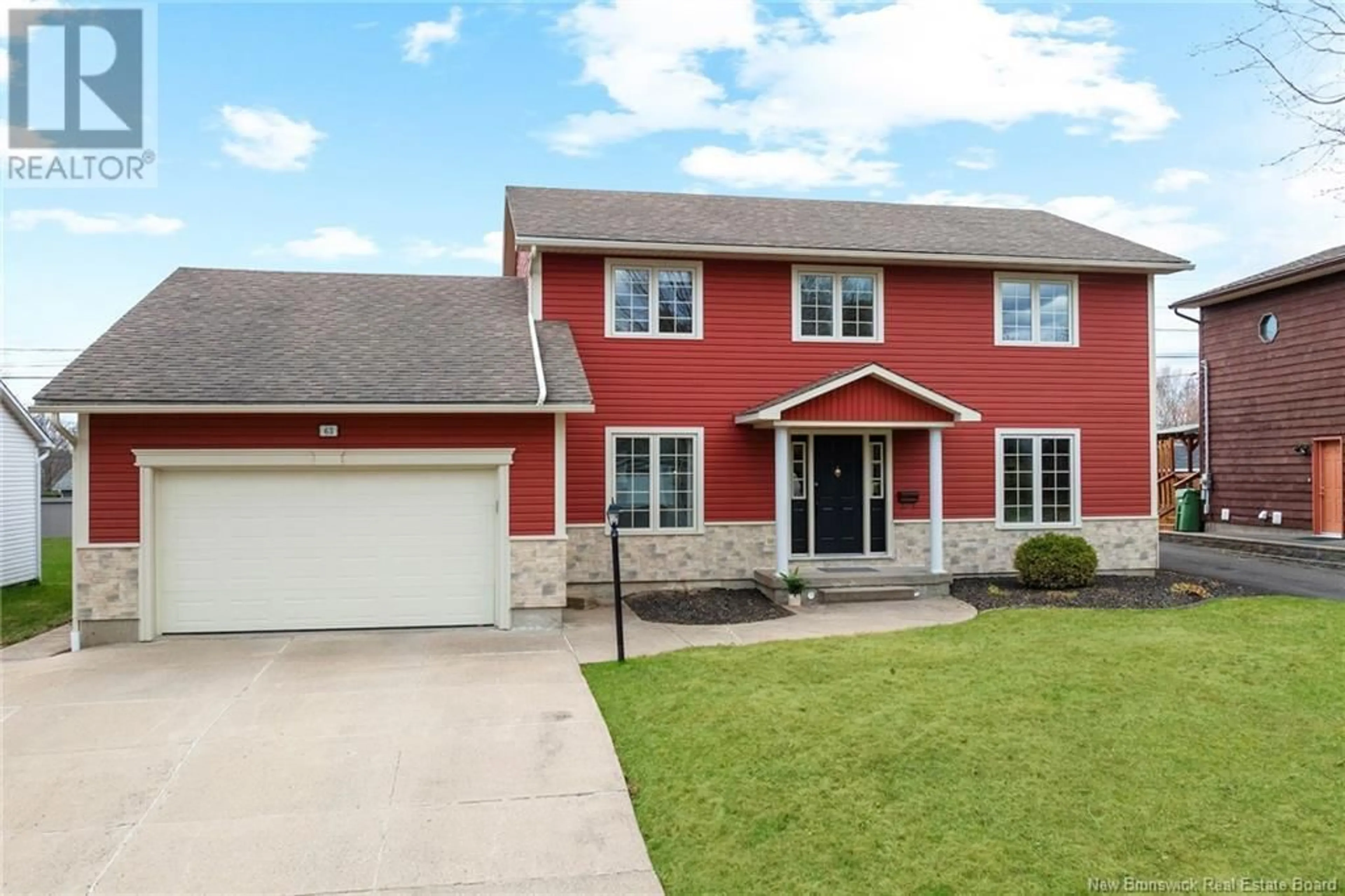 Home with vinyl exterior material, street for 63 EVANS STREET, Fredericton New Brunswick E3A5N5