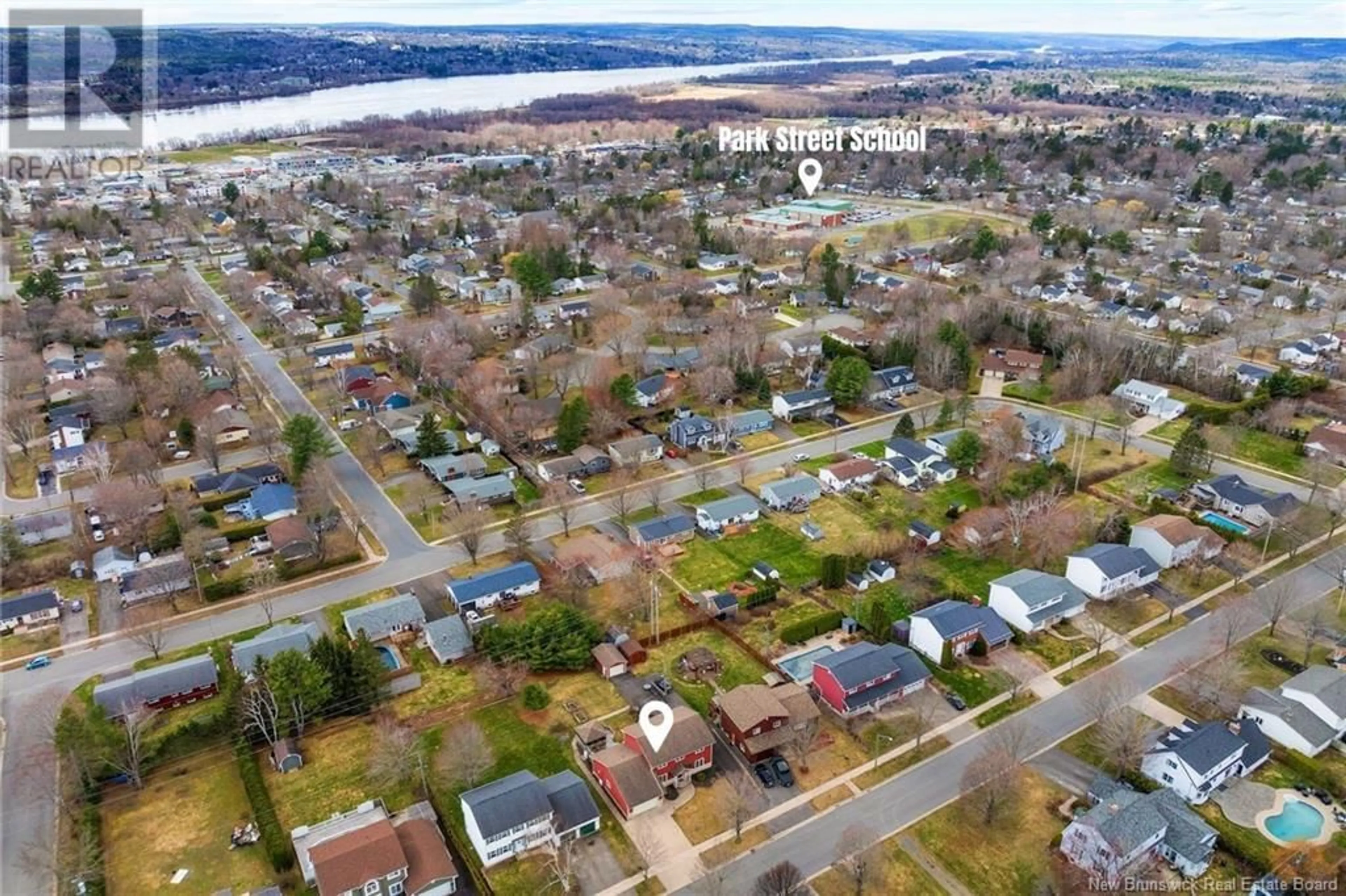 A pic from outside/outdoor area/front of a property/back of a property/a pic from drone, water/lake/river/ocean view for 63 EVANS STREET, Fredericton New Brunswick E3A5N5