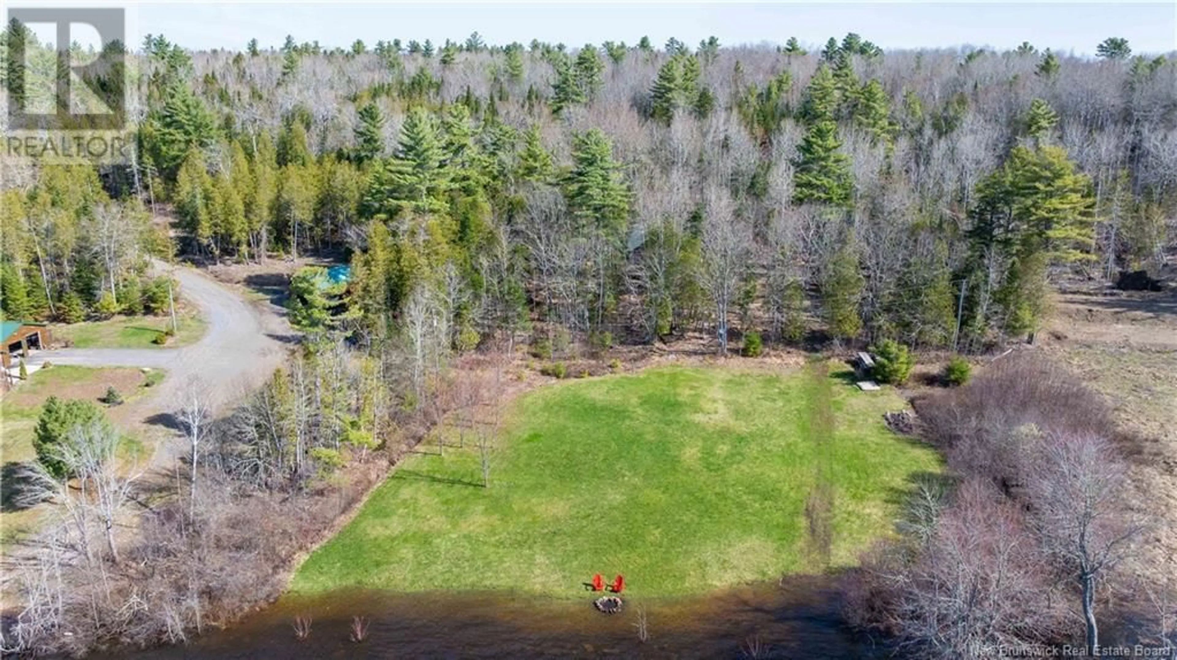 A pic from outside/outdoor area/front of a property/back of a property/a pic from drone, water/lake/river/ocean view for 15 SPICER LANE, Cambridge-Narrows New Brunswick E2L4E3