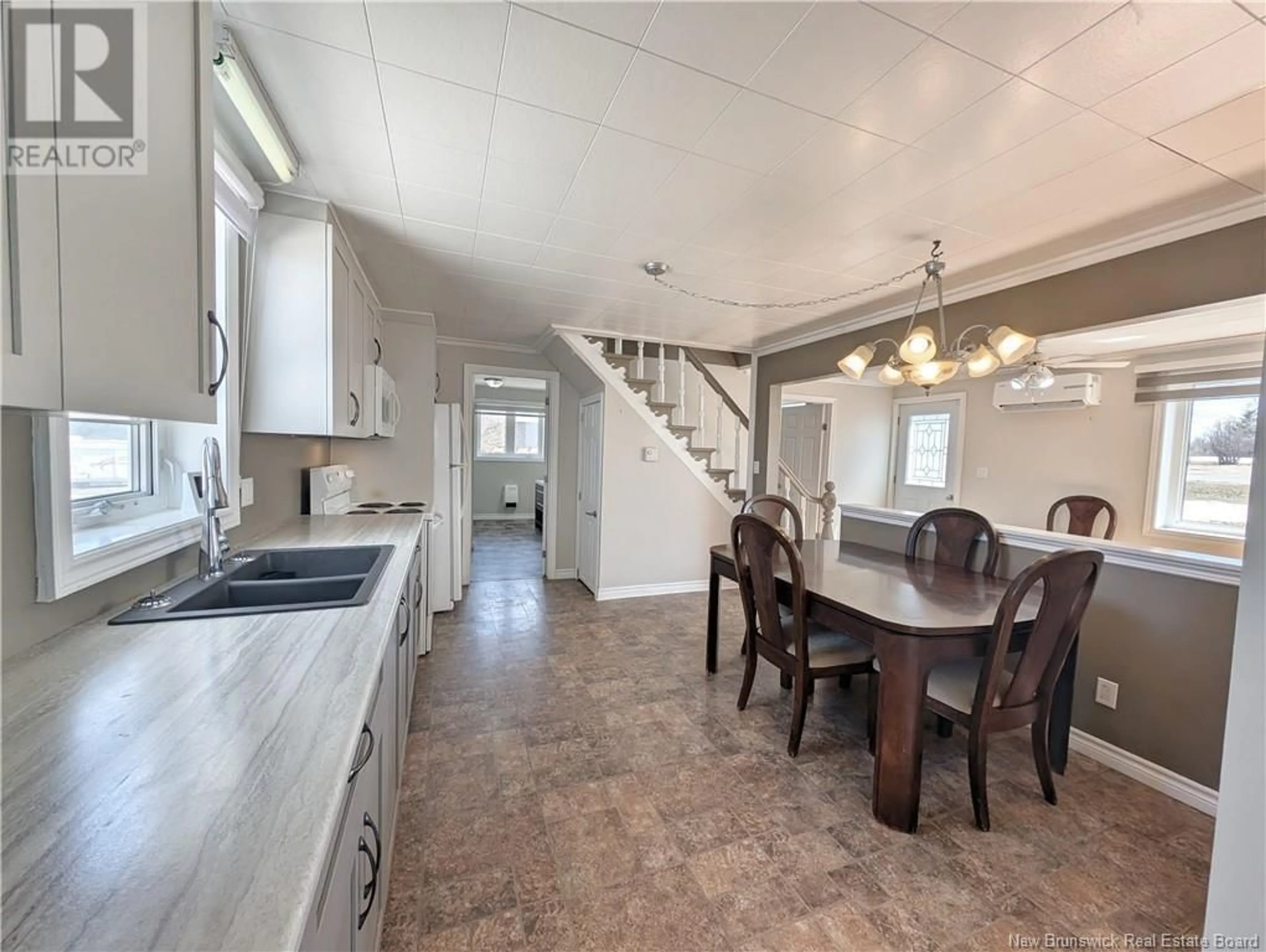 Open concept kitchen, ceramic/tile floor for 299 BD ST PIERRE E BOULEVARD, Caraquet New Brunswick E1W1B5