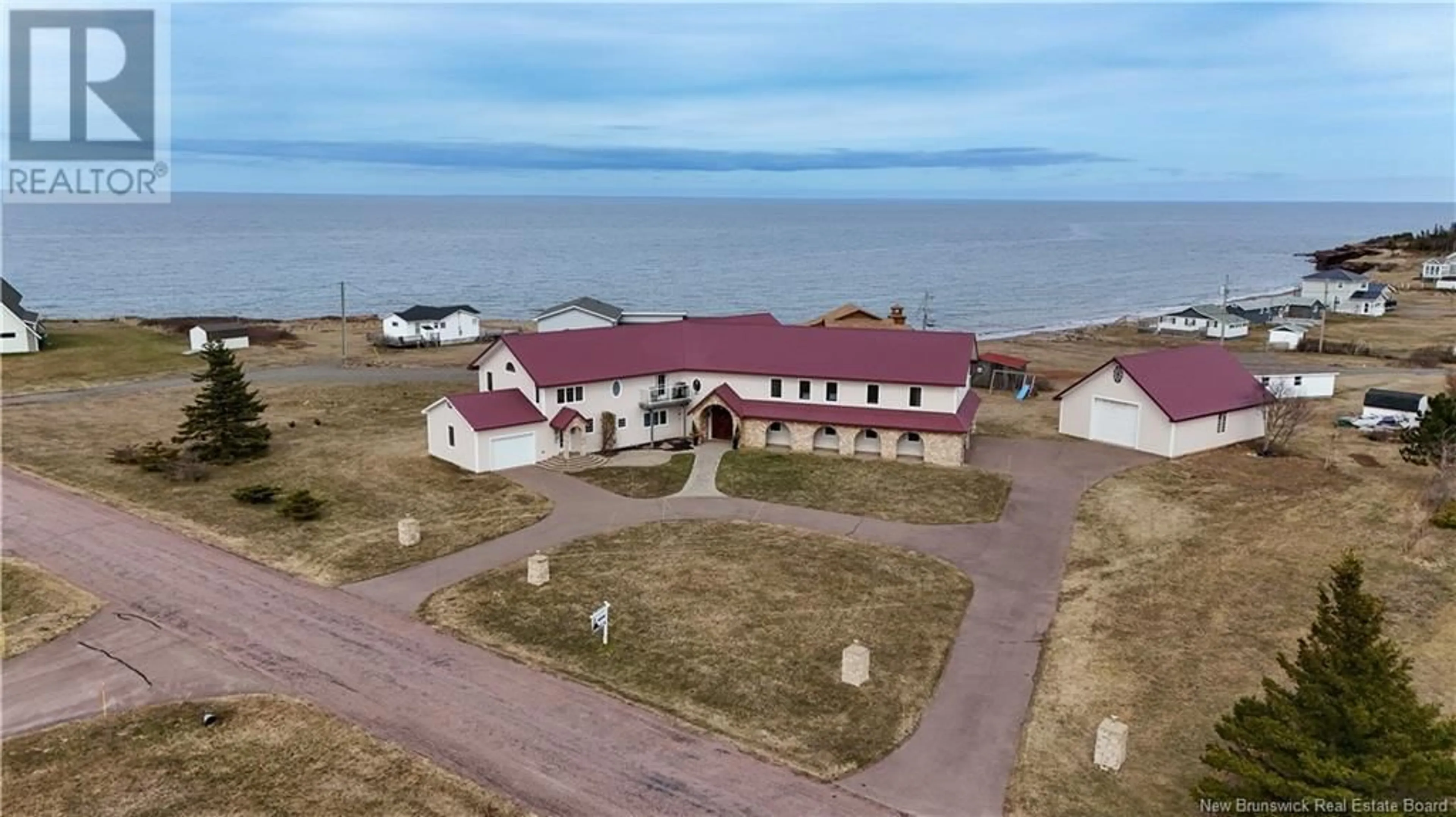 A pic from outside/outdoor area/front of a property/back of a property/a pic from drone, water/lake/river/ocean view for 51 VAUTOUR ROAD, Cap-Pelé New Brunswick E4N2C3
