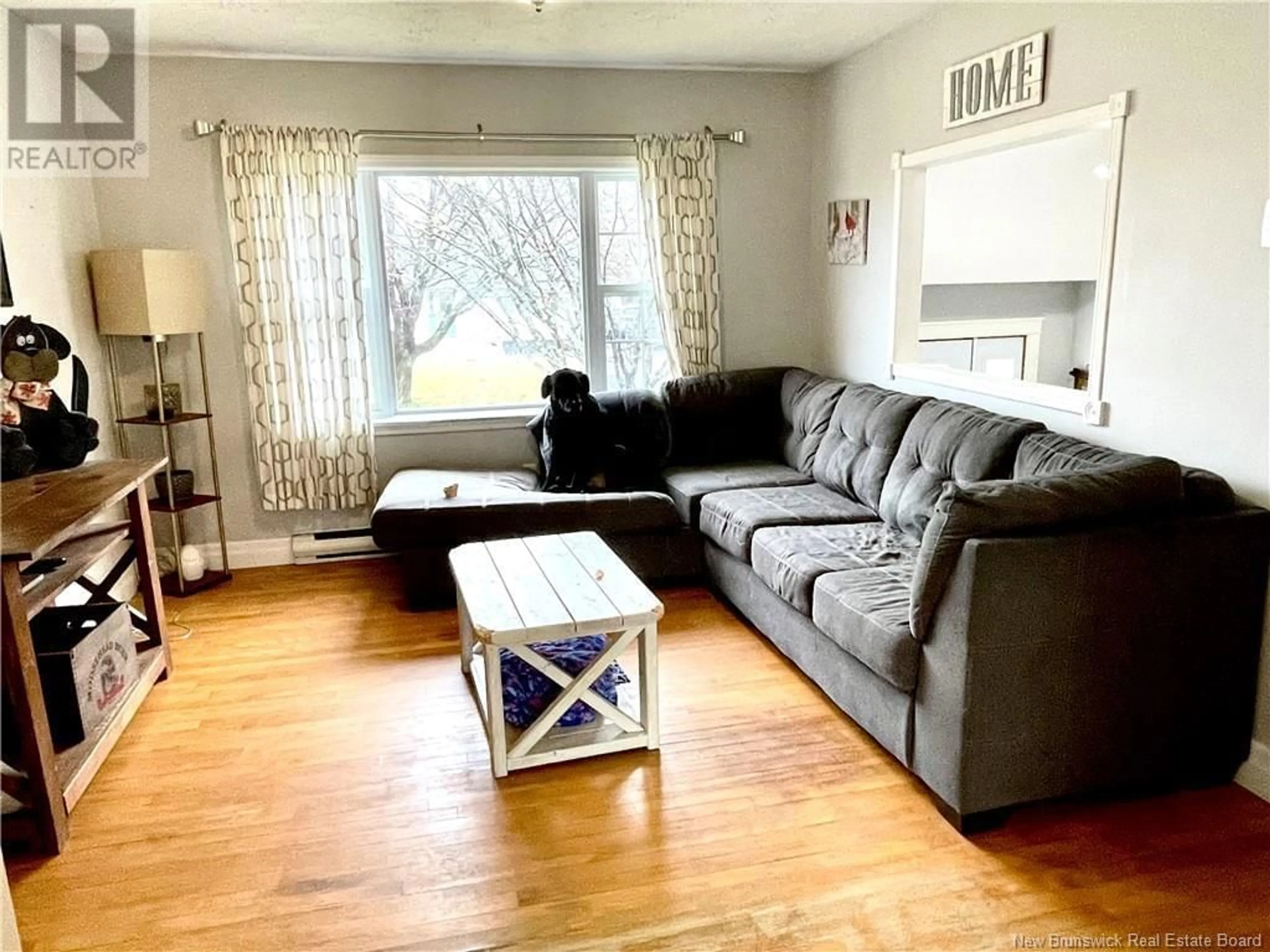 Living room with furniture, wood/laminate floor for 34 MORLEY CRESCENT, Saint John New Brunswick E2J2X6