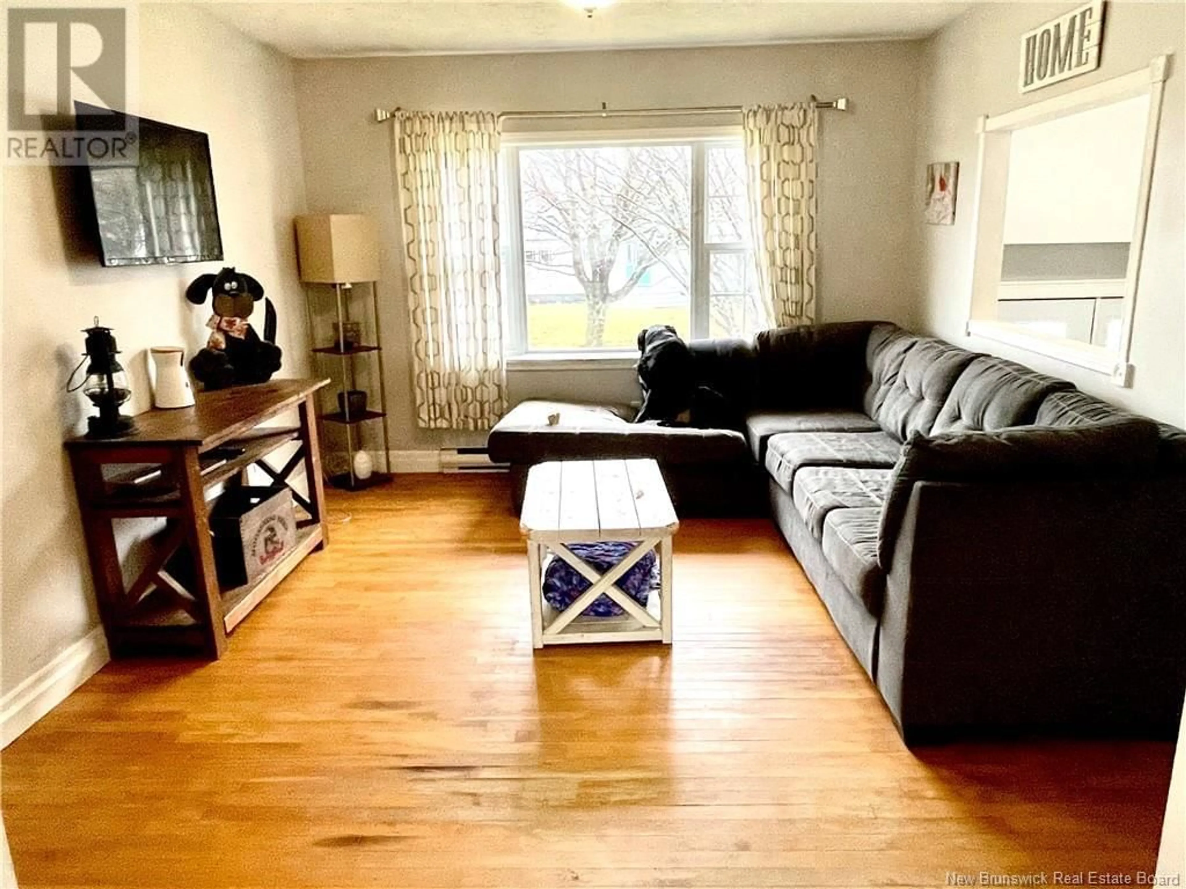 Living room with furniture, wood/laminate floor for 34 MORLEY CRESCENT, Saint John New Brunswick E2J2X6