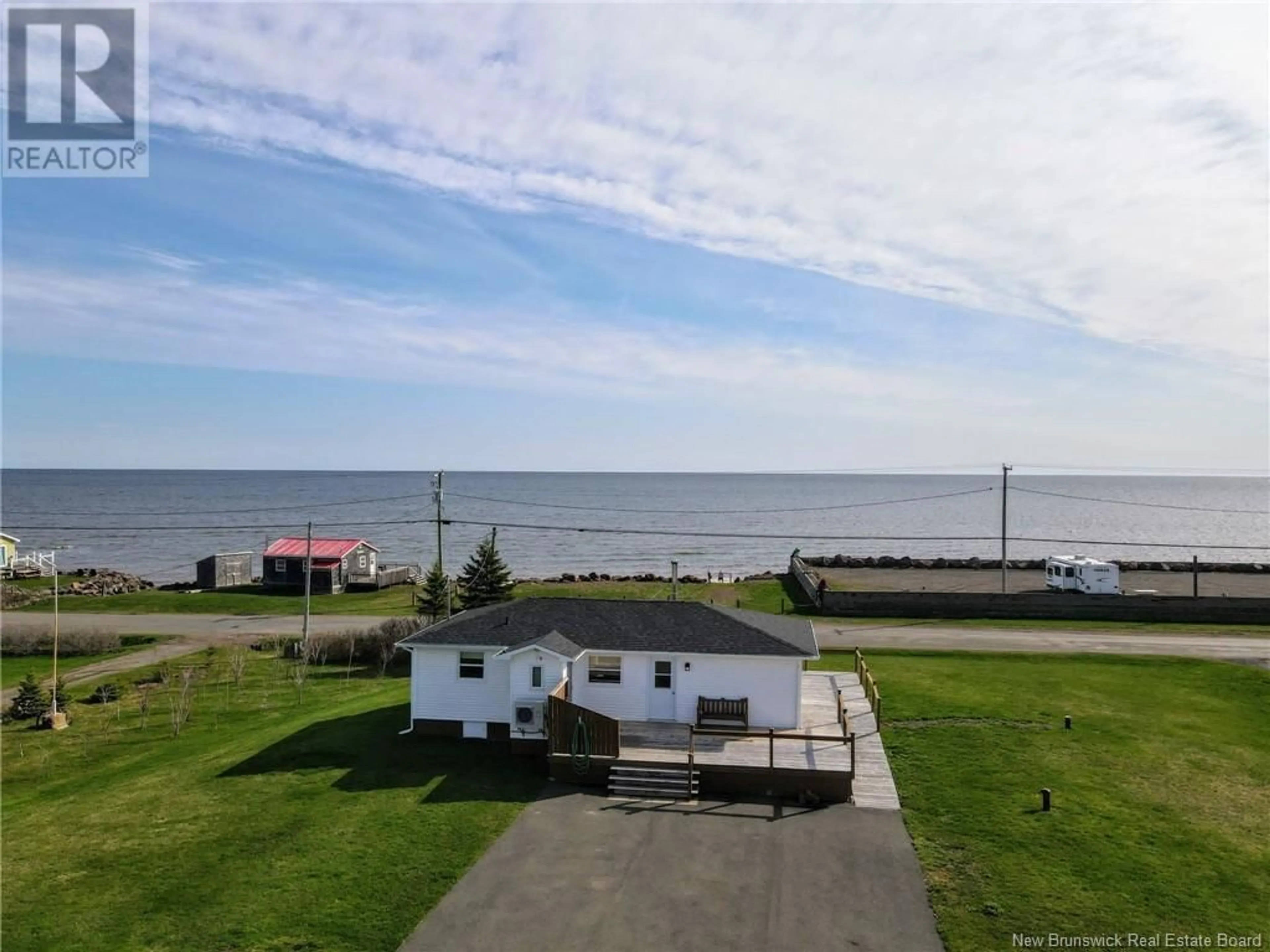 A pic from outside/outdoor area/front of a property/back of a property/a pic from drone, water/lake/river/ocean view for 179 CH DE LA COTE ROAD, Grande-Digue New Brunswick E4R1W8